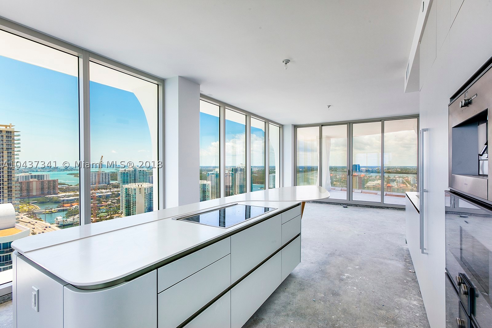 Amazing brand new unit with breathtaking views in the exclusive Jade Signature an increible opportunity at pre construction price (2013). Jade signature is the newest icon on billionaires beach row. This unit has 4 bedrooms and 5.5 bathrooms, media room, family room and service quarter, assigned tandem parking space.This corner unit has floor to ceiling windows throughout. The building has state of the art amenities including playrooms, library room, restaurant, exercise room and much more. This Unit is decorator ready.