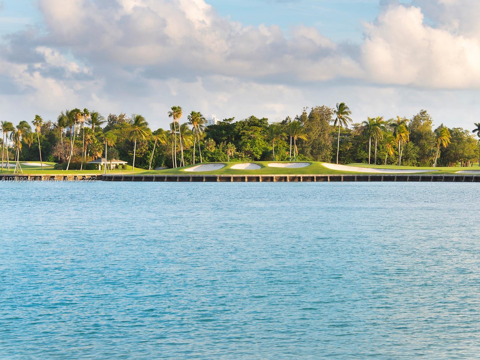 Sweeping southern wide bay water views over Indian Creek Golf Course from this stunning luxurious modern waterfront home in Bay Harbor Islands. 7 Bed / 7.2 Bath, open plan living with sliding telescopic doors providing indoor outdoor living to large covered outdoor patio. Smart turnkey contemporary residence, designed by architecture Choeff Levy in 2017. Interior design by Roberto Migotto (furniture not included in sales price). Modern gourmet kitchen with Subzero & Wolf appliances. Fully equipped outdoor summer kitchen. Lutron lighting control system. Master bedroom suite with private balcony, baccarat torches & marble throughout master bathroom. 500+bottle automated temperature-controlled wine cellar!