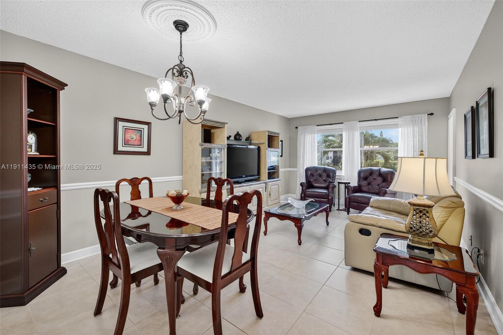 Very chic & classy remodeled unit with1 bedroom & 1 bathroom in the Rose Building, Hawaiian Gardens Phase 7. Wow, Enjoy breathtaking water views from your sunroom & from the living area, ideal for relaxing or entertaining or having a friend stay the night with you Queen size Murphy bed chest cabinet. Tile floor throughout, this one will sell all furnished and turnkey, ready to go. Impact windows, new kitchen, and updated bathroom. New Ac (2023) & new Water Heater (2024). HOPA-verified community, with lots of activities & amenities, including a sparkling pool, shuffleboard, bocce ball courts, darts, BBQ grills, & more. Internet is includedin your fees  Don't wait, this beautiful unit won't last long!