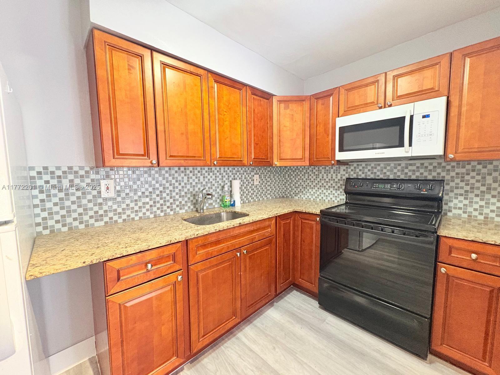 GARDEN FRONT VILLAS CONDO - Residential Lease