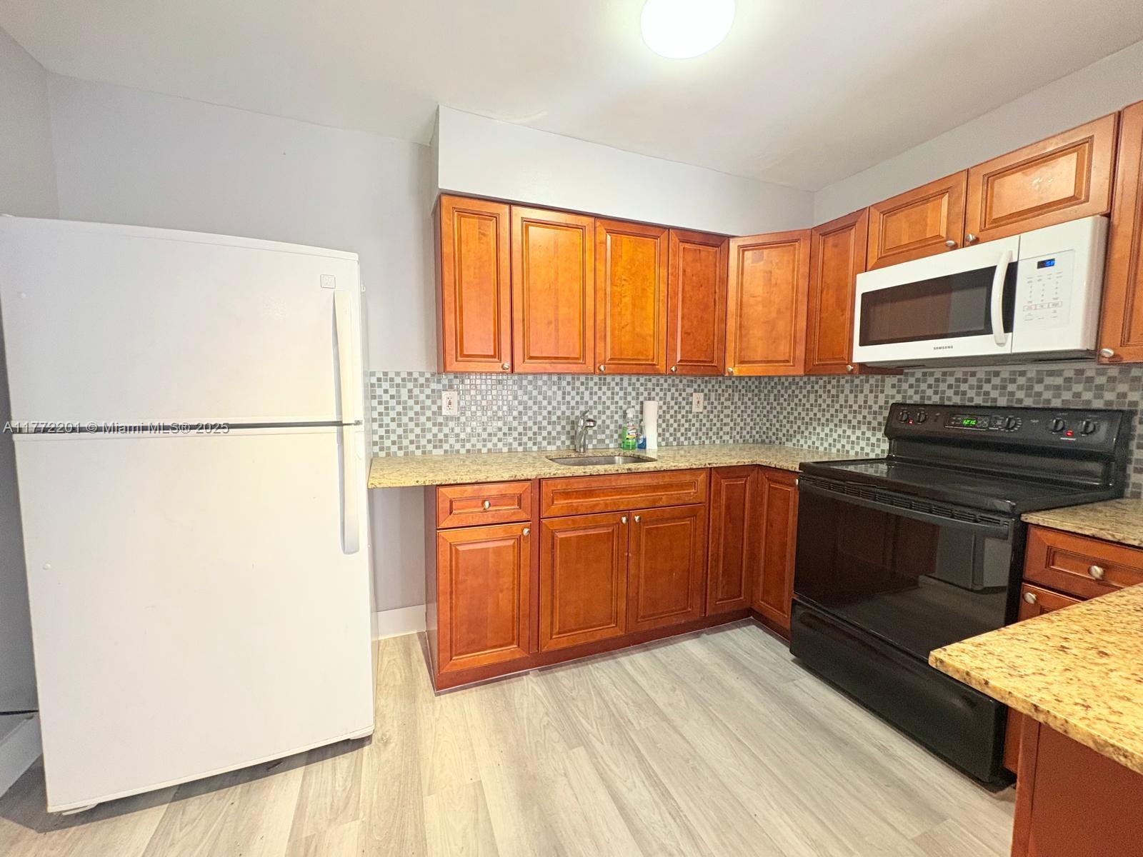 GARDEN FRONT VILLAS CONDO - Residential Lease