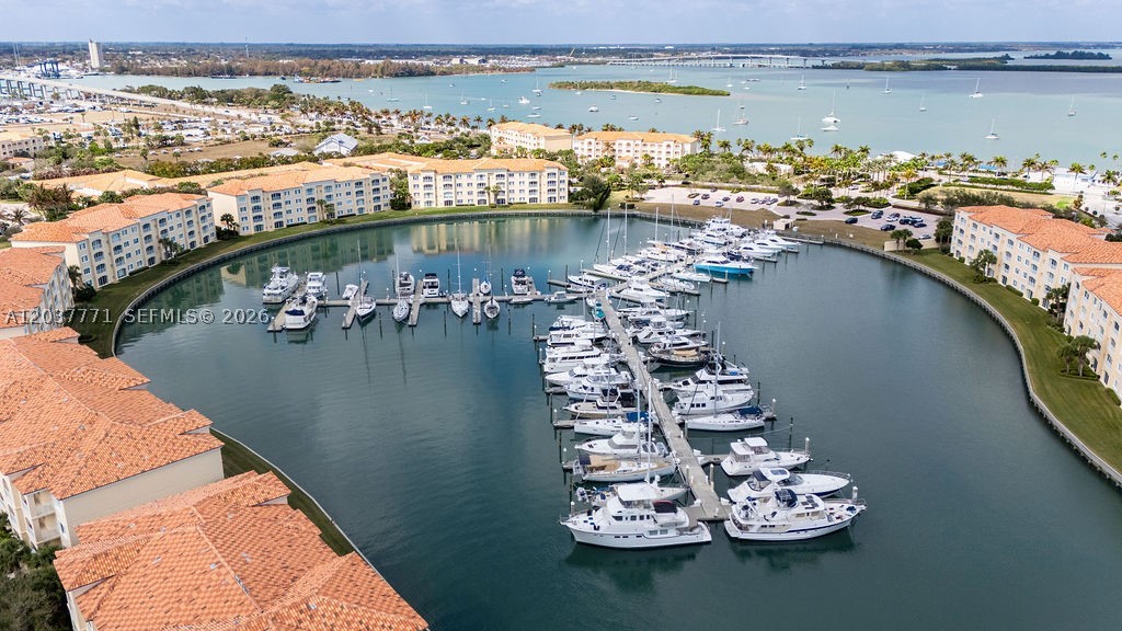Spacious 2BD/2BA waterfront retreat with nearly 2,000 sq. ft. in a beautifully maintained gated community just steps from the river and a short walk to the beach. This first-floor residence features brand-new appliances and exceptional amenities including a private marina, pickleball, resort-style pool, fitness center, and dog park. Enjoy relaxed coastal living in this serene, move-in-ready home. Sizes are approx./subject to error.