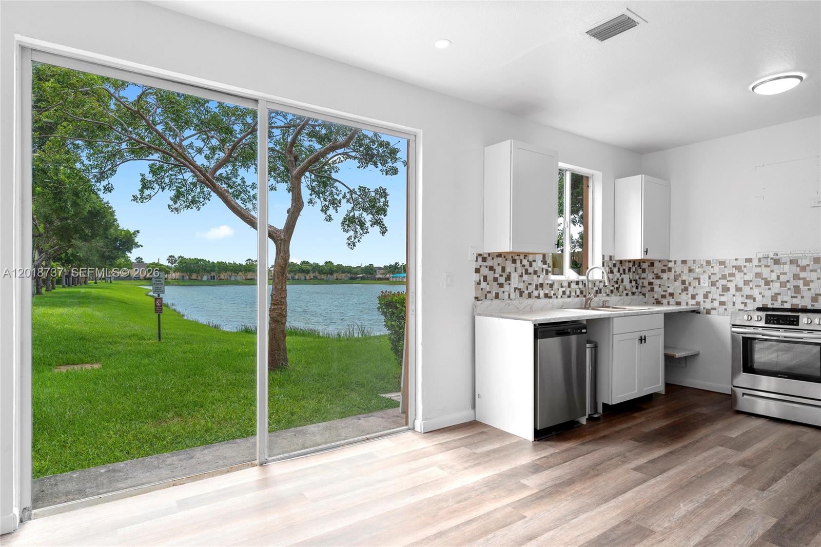 Spacious 3 bedroom 2.5 bathroom townhouse located in the gated community of Shoma Townhomes at Keys Cove in Homestead. This two story residence offers 1,302 SF of living space with lake views, assigned parking, and a functional layout ideal for both end users and investors. Community features include security, common areas, and recreational amenities. Conveniently located near major highways, shopping, dining, schools, and parks. Great opportunity to own in a rapidly growing area of Homestead. Easy to show.