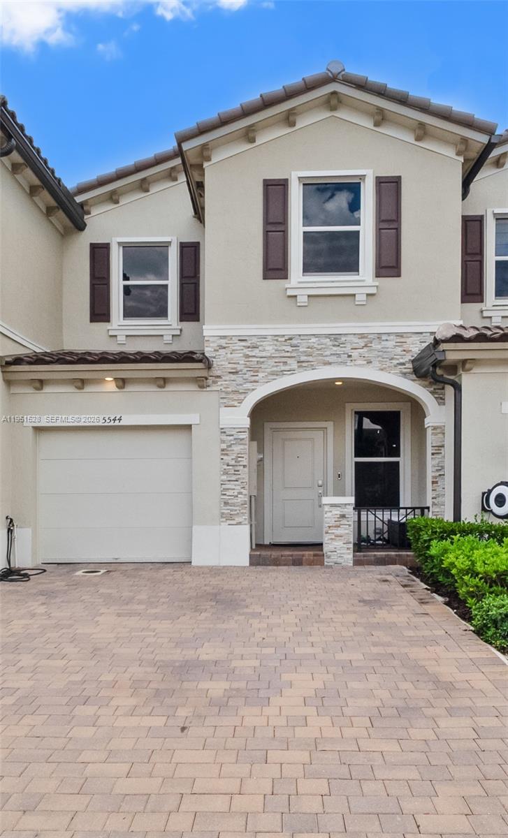 Stunning Townhome 2023 year built in a Gated Boutique new community. Enjoy a lake view from the living-dining area, open-concept kitchen, and private patio. Upper floor: master suite with walk-in closet and full bath, plus 2 bedrooms . 1 car garage + 2 parking spaces (driveway). Ring security system included.