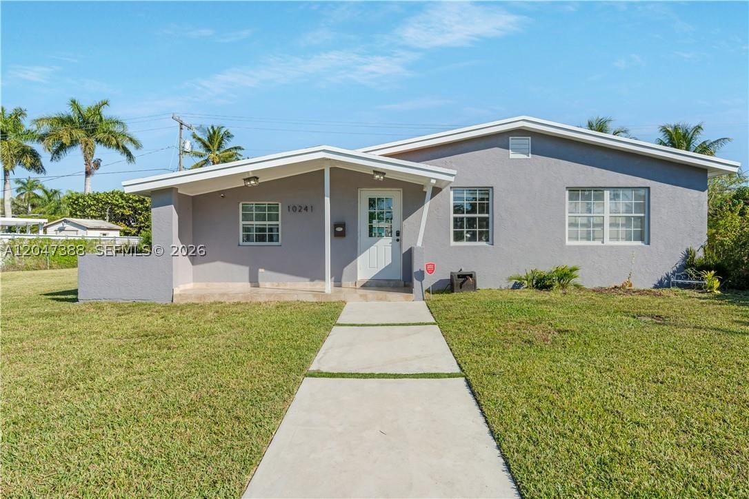 Welcome to this charming 3-bedroom, 2-bathroom home located in the heart of Cutler Bay. Featuring upgraded modern flooring throughout and a beautifully renovated kitchen with quartz countertops and stainless steel appliances, this home offers a perfect blend of style and functionality. Enjoy an oversized backyard with plenty of room to add a pool ideal for entertaining or creating your own outdoor oasis. The newly installed patio roof provides the perfect shaded space for relaxing or hosting gatherings. Conveniently located near shopping, dining, parks, and major highways. This move-in-ready home is a must-see!