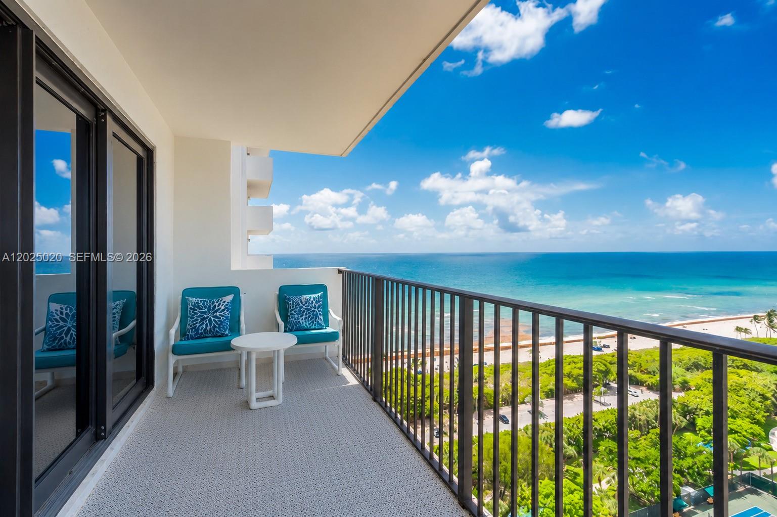 Unobstructed Panoramic Ocean & Intracoastal views from every room — 20th floor, South-facing in Summit Towers' North Tower, bathed in all-day sunshine. One of the most permanently view-protected addresses not just in the complex, but in all of Hollywood Beach — the view corridor secured forever by the building's own amenities grounds. | Move-in ready, this 2-bed/2-bath + Den spans 1,570 sq ft. The renovated kitchen features light, modern countertops and newer appliances. Tile floors throughout the main living areas, IMPACT WINDOWS, IN-UNIT LAUNDRY, and a 132 sq ft private balcony with sweeping water views. | The den is ideal as a home office, sitting room, or guest space. | Summit Towers sits on nearly 9 acres with two pools (one heated, both with water views), direct beach access with lounge chair service, fitness center, tennis, pickleball, party room, library, card room, café, BBQ areas, covered bike storage, and 24-hr doorman/CCTV security. A vibrant community with year-round clubs and events. | On the southern tip of the Hollywood Broadwalk — walking distance to dining, shops, and live entertainment. Minutes to FLL Airport. Newly reopened Hollywood Beach Golf Club (Richard Mandell design) — 5 min away. | Perfect as a full-time residence, a seasonal retreat, or a combination of both! | Flexible Showing times! | Included: premium 1st-floor assigned parking and 1st-floor covered & air-conditioned storage unit. Additional parking spots possible.