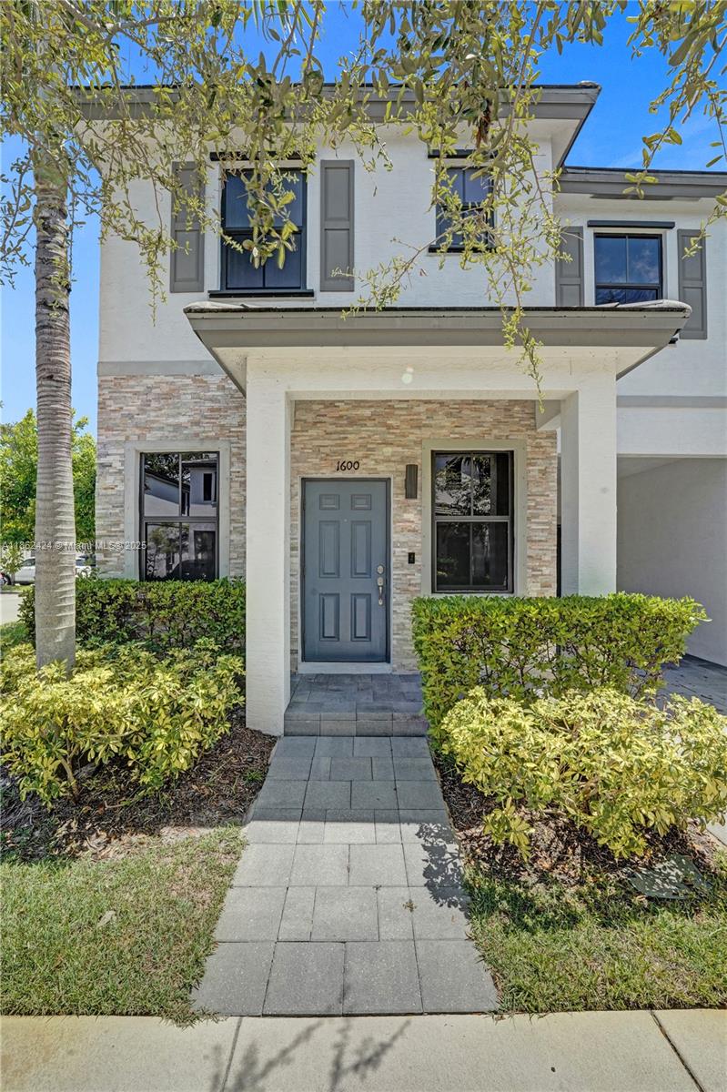 Luxury living in a gated community! Enjoy the privacy of a corner lot with hurricane impact windows and doors. Freshly painted and featuring high ceilings, this fully upgraded 3-bedroom, 2.5-bath home shows impeccable attention to detail—owner spared no expense! Custom closets in every room, designer shades on all windows and doors, plus special film to keep the home cooler. Smart home technology throughout with newer appliances and washer/dryer. Convenient half-bath downstairs for guests, 1-car garage plus extra driveway parking, a community pool just steps away, and a cozy backyard perfect for grilling.