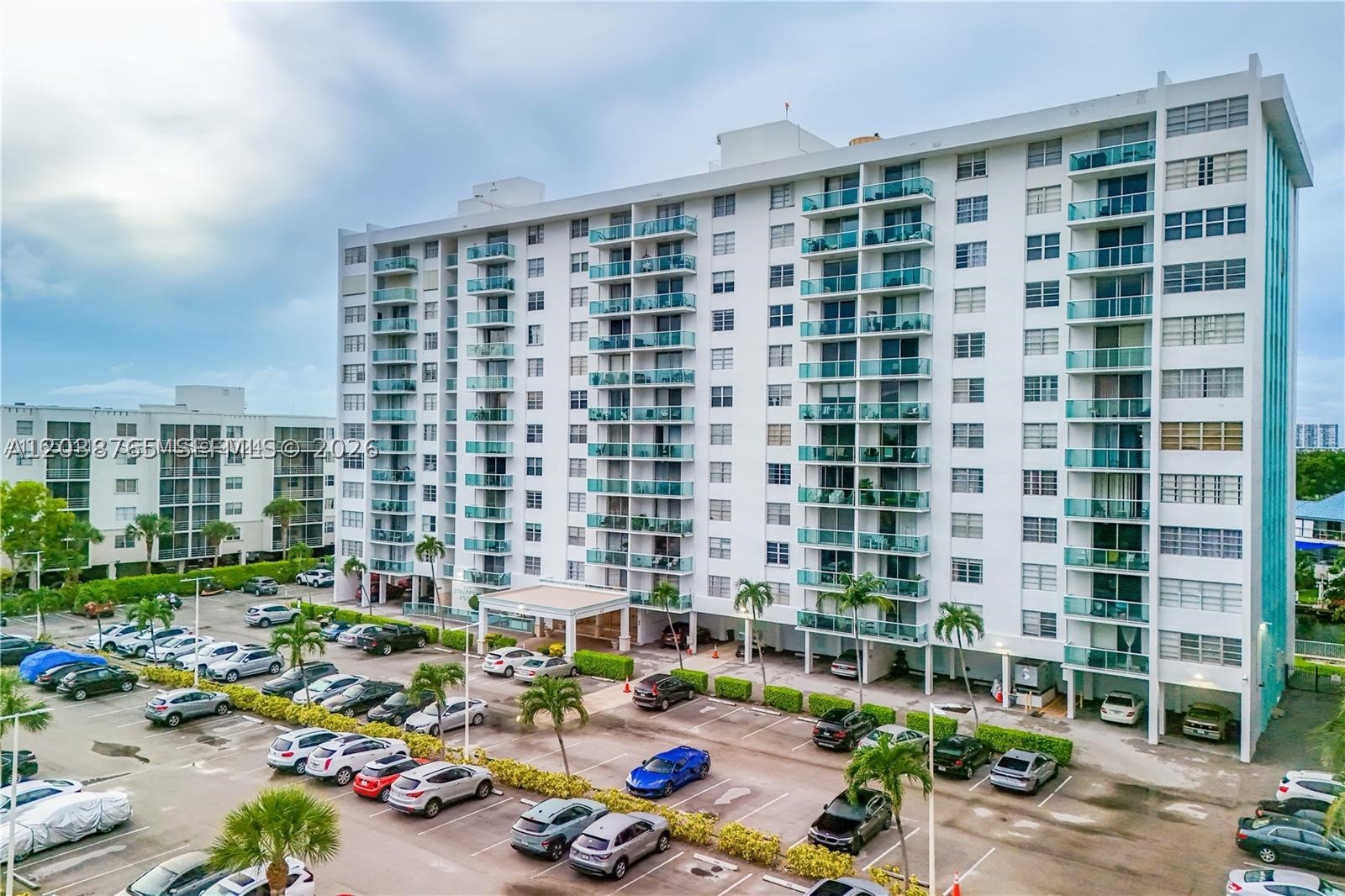 Enjoy South Florida living in this spacious 1-bedroom, 1.5-bath condo ideally located in North Miami Beach, just minutes from Sunny Isles Beach, Aventura, and Oleta River State Park. This bright residence features beautiful wood flooring throughout, an updated kitchen with granite countertops, stainless steel appliances, modern cabinetry, and an oversized living and dining area that opens to a private balcony with expansive views of lush greenery and the city skyline.

The generous primary suite offers ample closet space and an en-suite bath, while the additional half bath provides convenience for guests. The well-maintained building features secured entry, elevators, and a covered drop-off area. Enjoy a low HOA and an unbeatable location close to beaches, shopping, restaurants, parks, and major highways. Vacant and easy to show. Perfect as a primary residence, seasonal retreat, or future investment. Please note: rentals are not permitted during the first two years of ownership.