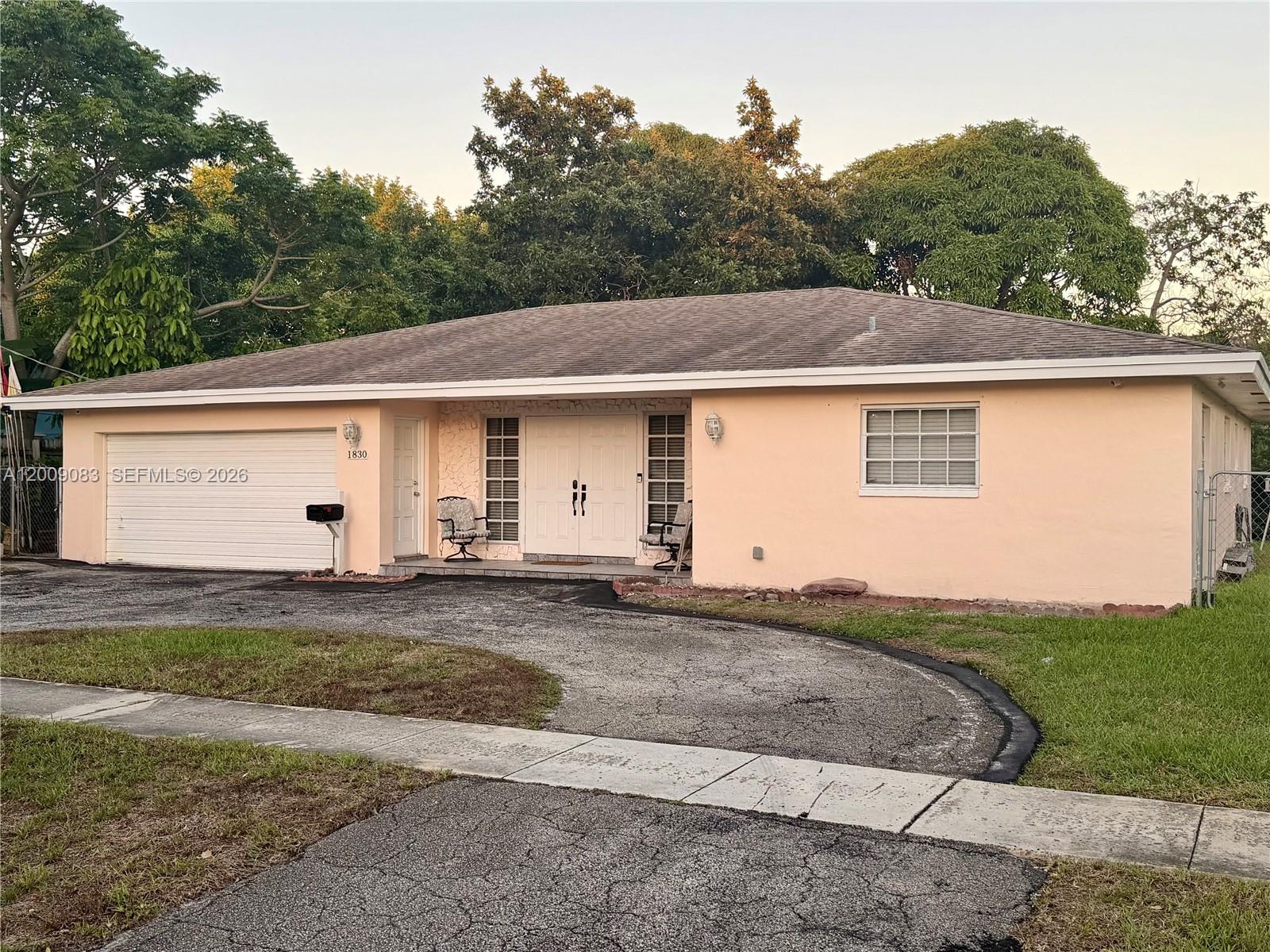 Welcome to this beautiful 3-bedroom, 3-bath home featuring a circular driveway and a fenced backyard overlooking canal. Inside, you’ll find tile flooring throughout the main living areas and laminate flooring in all bedrooms for easy maintenance and a modern look. The Florida room offers additional living space — perfect for a home office, playroom, or even converting into a fourth bedroom. Conveniently located just 1.2 miles from the Turnpike entrance, this home offers both comfort and accessibility for commuters.