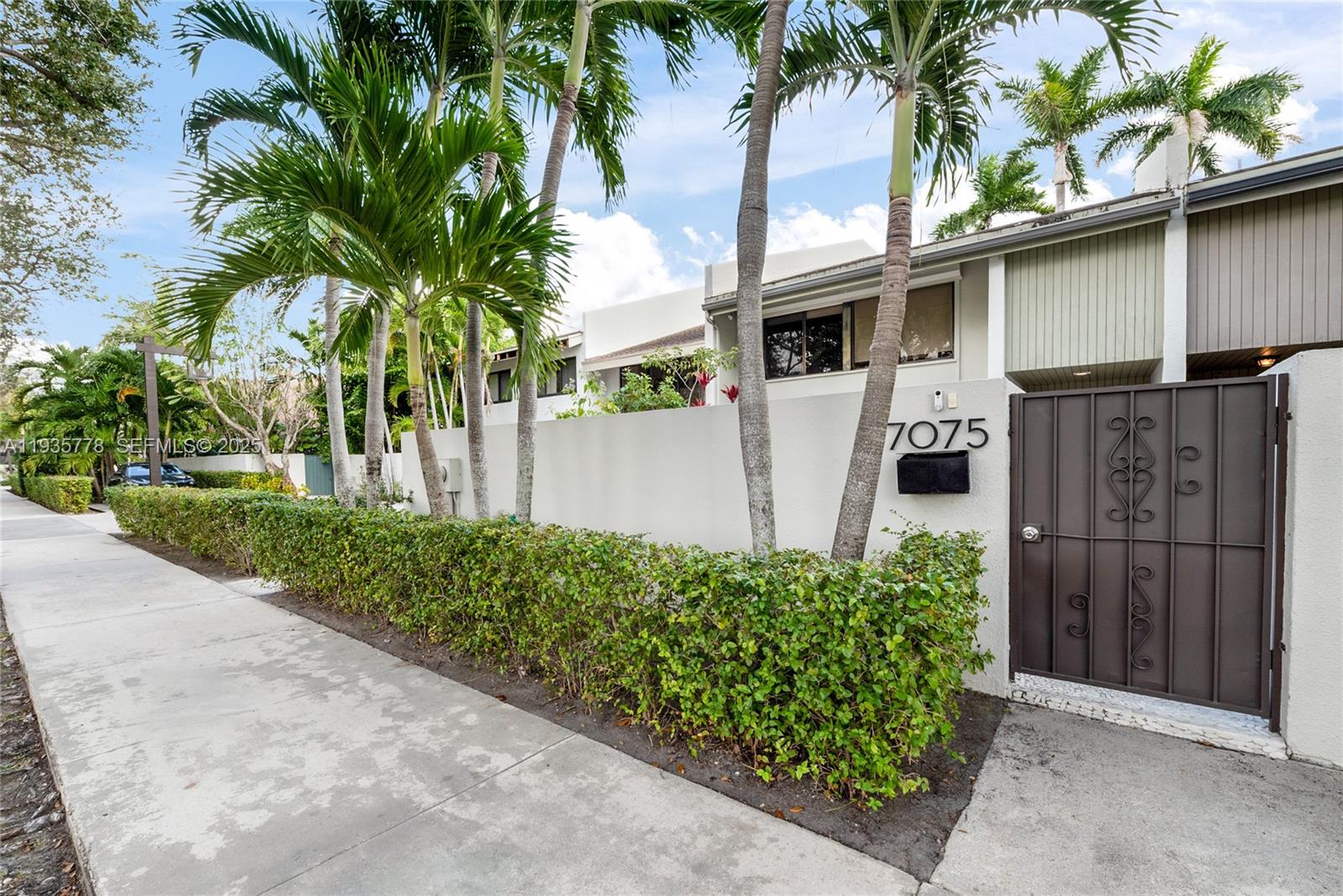 Beautifully renovated 3-bedroom, 2.5-bath residence located within Bayans of South Miami. This home features a thoughtfully redesigned layout that allows seamless integration of the three main social areas, creating an open and functional living experience ideal for entertaining. The property offers two distinct outdoor spaces, including a front patio and a private backyard patio with BBQ area, enhancing indoor–outdoor flow and versatility.

Bedrooms are more spacious than the original layout, with secondary bedrooms offering additional flexible areas ideal for a home office, study space, or den. The primary suite includes a private balcony, providing a quiet retreat with natural light and outdoor connection. Renovations include modern finishes, updated flooring, contemporary kitchen and bathrooms, and well-maintained systems throughout.

The community is currently undergoing extensive improvements, with all common areas being renovated and redesigned, and all unit roofs being replaced, adding long-term value and peace of mind. Community amenities include swimming pools, tennis courts, and recreational spaces. Conveniently located near schools, shopping, dining, and major roadways. Easy to show.