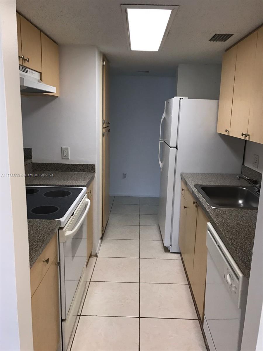 PALM AIRE GARDENS CONDO - Residential Lease