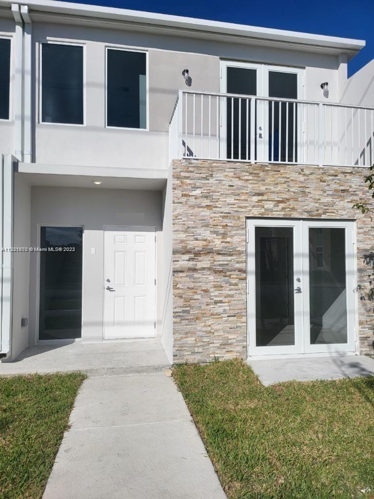 New construction townhome 4 bedrooms and 3 1/2 baths. The concrete structure features
impact windows & doors, and porcelain tile in all areas. Modern open kitchen with stainless steel appliances.
Bedroom on the first level with walk-in closet and bathroom. Includes washer & dryer inside of the unit, tankless
water heater, and new AC. Be the first to live in this brand new home with top of the line finishes.