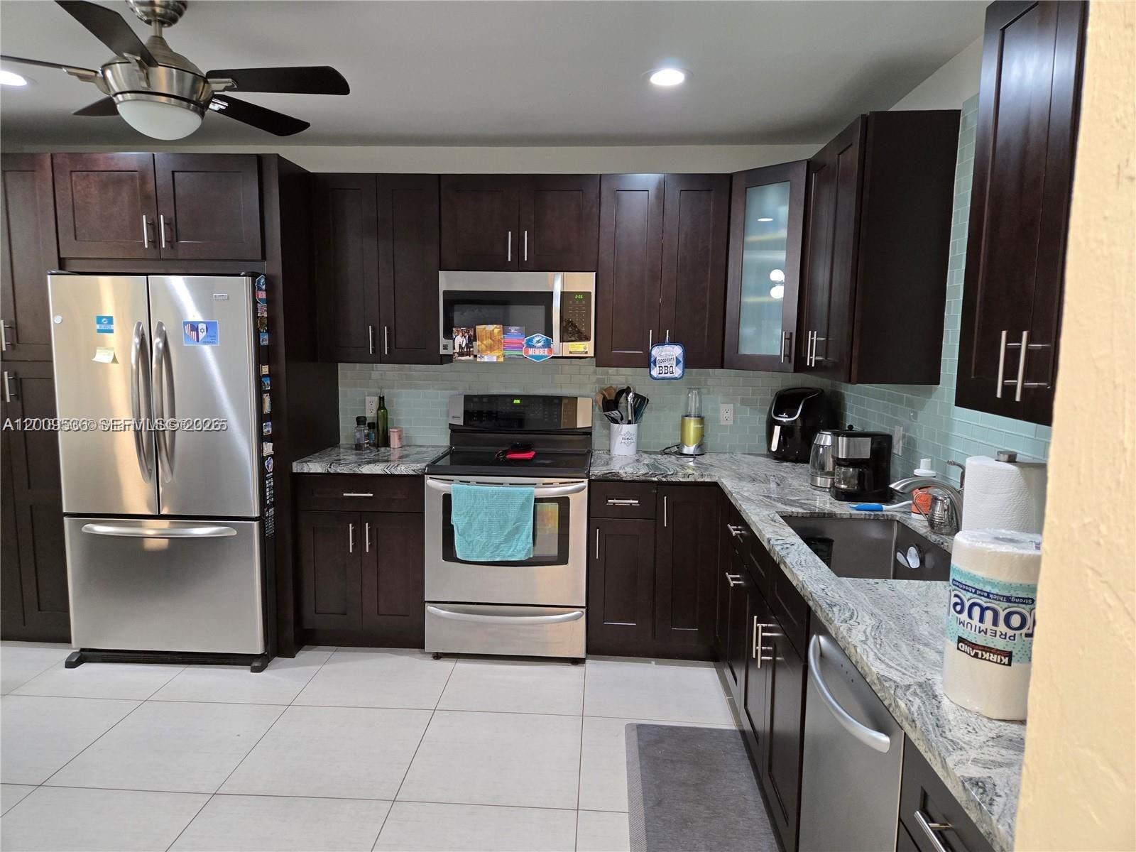 Beautiful 3-bedroom, 2.5-bath townhouse in the desirable Las Haciendas at Jacaranda community in Plantation. This spacious home features an updated kitchen with dark wood cabinetry, granite countertops, stainless steel appliances, and a stylish tile backsplash. The open layout offers a comfortable living and dining area with plenty of natural light, tile flooring throughout, and a convenient downstairs bedroom. Upstairs, you’ll find two additional bedrooms, including a generous primary suite with updated baths. Additional features include a screened patio, in-unit washer and dryer, and assigned parking with guest parking nearby. Conveniently located near shopping, dining, major roads, and local amenities.

Tenant Occupied- will vacate within 30 days of closing