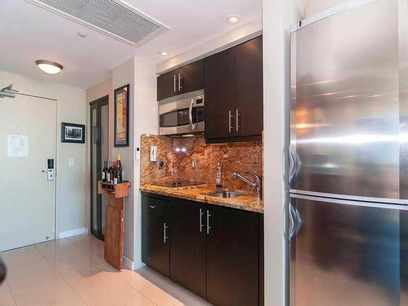 This is a NYC style chic total upgraded studio. Fit for any exec looking for beautiful views, upscale unit in full service hotel condo.balcony,fine furnishings, high impact doors,granite counters,stainless steel appliances, tons of storage. Tile floors. w alk to all cafes,shops,nightlife.one of a kind studio.