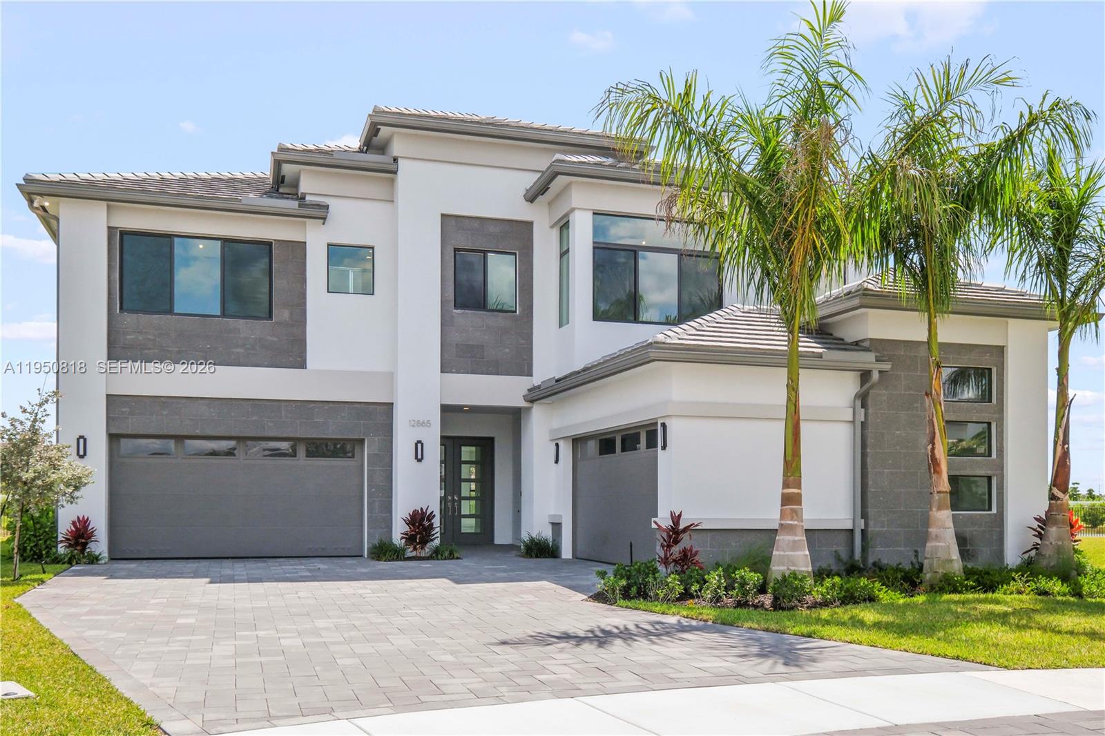 Experience luxury living at its finest in this exceptional estate set on a rare, oversized pie shaped lakefront lot offering unmatched privacy and breathtaking views. This stunning residence features 5 bedrooms, 5 full and 2 half baths, a den, game room, media room, and a 4 car garage, all thoughtfully designed across 6,591 total square feet. Soaring volume ceilings, smooth finished walls and ceilings, and solid core doors elevate the home’s sophisticated appeal. The chef’s kitchen is a showstopper, equipped with top-of-the-line Wolf and SubZero appliances, perfect for entertaining and everyday elegance. With over $300,000 in premium upgrades and one of the most desirable lots in the community, this home truly stands apart. Enjoy tranquil mornings and sunset evenings from your private balcony overlooking the lake. The massive backyard is nothing short of spectacular rarely found and ideal for creating your own private oasis. Located in a highly sought-after community, this home offers the perfect blend of luxury, privacy, and lifestyle. A rare opportunity that won’t last long, come see it for yourself and fall in love.