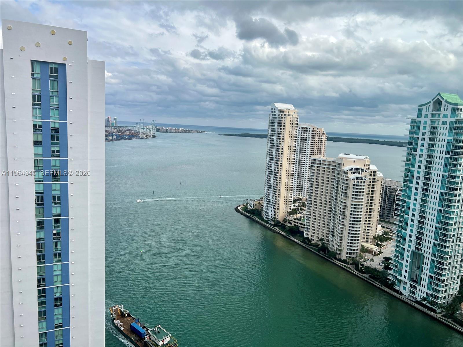 TWO assigned parking spaces! Bring your most discerning tenants! East exposure. Situated in the vibrant core of Downtown Miami. Amazing views! Elegant tile floors throughout, this unit is TOP! Black-out shades in all rooms. Washer & dryer combo. Water, basic cable and Internet included. Brand new LifeFitness gym equipment. Walk to Whole Foods Market, Bayfront Park, metro mover, Novikov Restaurant and Joe & the Juice downstairs plus Gordon Ramsay's Hell's Kitchen and 17 screens' Silverspot Cinema. Steps to sports, art venues, restaurants & shops. Building offers luxurious life style, 24-hr front desk attended. Chic downtown living at its best!
