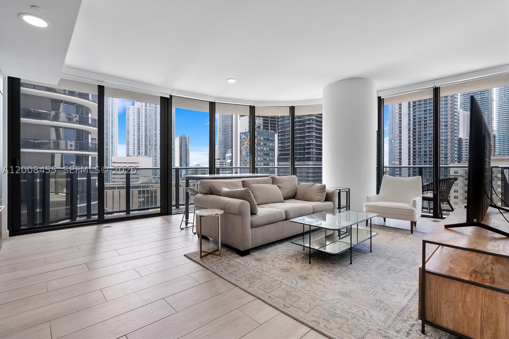 Presenting a sophisticated residence in the heart of Brickell, ideally positioned near the vibrant energy of Brickell City Centre and Mary Brickell Village. This exceptional 2-bedroom, 2-bathroom plus den home showcases a thoughtfully designed split floor plan, offering both privacy and functionality with refined, modern elegance throughout. The residence is appointed with a top-of-the-line kitchen, Italian porcelain tile flooring, and expansive floor-to-ceiling windows that flood the interiors with natural light while framing dynamic city views. Custom window treatments enhance both style and comfort, while a spacious wraparound terrace provides a seamless extension of the living space, perfect for elevated indoor-outdoor living and entertaining. Residents enjoy access to an impressive suite of resort-style amenities, including 24-hour security, a state-of-the-art fitness center, three resort-style pools, a beautifully designed screening room, multiple entertainment and club lounges, concierge services, a dedicated yoga and aerobics studio, spa facilities, and a Jacuzzi. The building also features a premier three-story, 35,000-square-foot Equinox fitness center, offering an unparalleled wellness experience. Perfectly situated near Brickell’s finest dining, nightlife, and luxury retail destinations, this pet-friendly residence also offers exceptional flexibility for investors, with the ability to lease up to 12 times per year. Mortgage savings may be available for buyers.