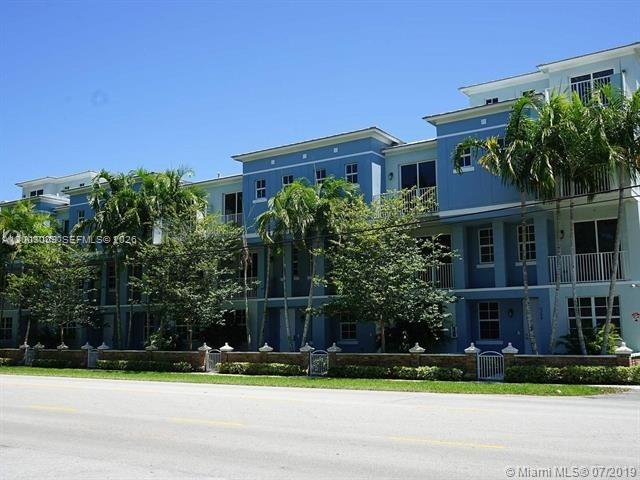 REDUCED! Luxurious, 3 story townhouse with high end finishes. It features a kitchen with custom wood cabinetry with granite counter tops, stainless steel appliances, big balconies on all floors above first level, perfect for family outdoor reunions and entertaining, full size washer and dryer in full equipped laundry room, large 2-car garage with smart garage opener operated from anywhere via a smart phone. 4 spacious bedrooms, 3 full bathrooms with double sink in master bath, 1 guest bathroom, plenty of closet space. Great location close to class A schools. Easy to show, IT IS A MUST SEE!!! FAST APPROVAL!!!
