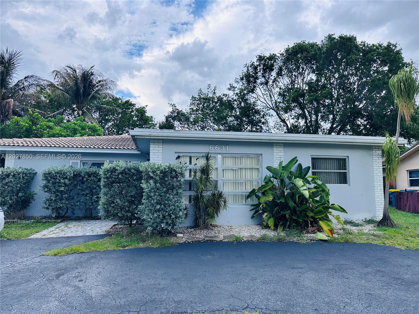 Welcome to this beautifully updated 3 bedroom, 2 bath single family home located in the desirable Sunflower community of Tamarac. This well-maintained residence features an upgraded kitchen with modern finishes, perfect for everyday living and entertaining. Enjoy peace of mind with a brand-new A/C system installed in 2025, a new flooring throughout, completed in 2024 and a private pool. The spacious layout offers comfortable living areas, generously sized bedrooms, and plenty of natural light. Situated in a pet-friendly neighborhood, residents enjoy a welcoming community atmosphere and amenities like swimming pool. tennis court and children's playground while benefiting from a mandatory HOA that helps maintain the area’s appeal. Currently tenant-occupied through the end of July, an excellent opportunity for investors seeking immediate rental income or future homeowners planning ahead. Conveniently located near shopping, dining, parks, and major roadways.