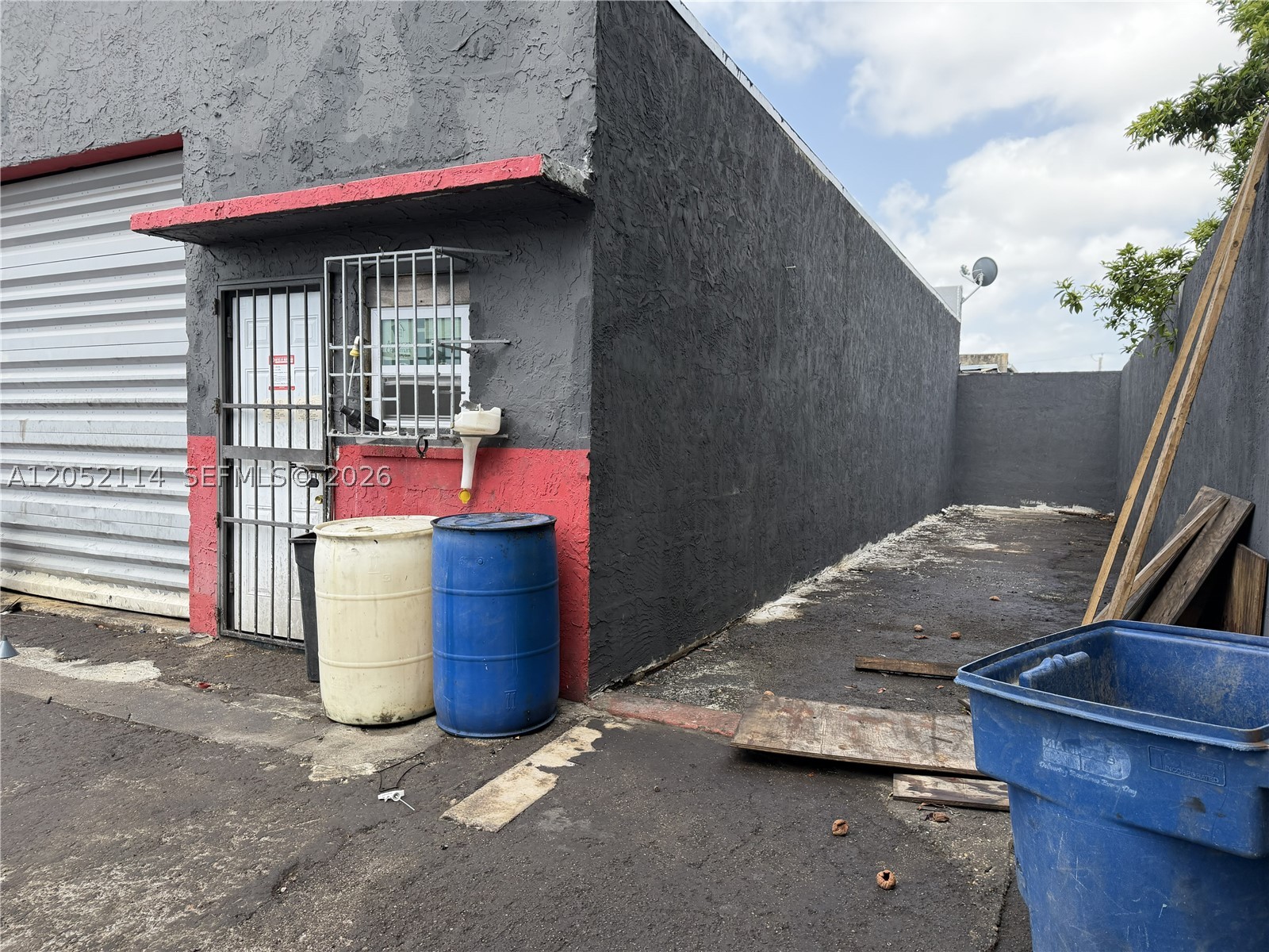 Excellent opportunity to lease a ±1,000 SF warehouse in a prime central Miami location. This 20' x 50' industrial space features approximately 15-foot clear ceilings, a 10-foot grade-level roll-up door, private office, and private restroom. Built in 1975, this versatile property is ideal for contractors, warehouse/distribution, storage, light manufacturing, e-commerce, import/export, and other permitted industrial uses. A standout feature of this property is the additional outdoor area with three dedicated parking spaces or storage, providing valuable flexibility for company vehicles, trailers, equipment, inventory, or outdoor materials. Conveniently located just off NW 27th Avenue, the property offers quick access to SR-112, I-95, Miami International Airport, Downtown Miami, and the Port of Miami, making it an excellent location for businesses serving the entire Miami-Dade market.NO CAM charges. Immediate occupancy available.
Need additional space? The adjacent warehouse at 2561 NW 23rd Street is also available for lease, offering an excellent opportunity for tenants seeking additional warehouse capacity or the flexibility to expand their operations next door. Contact the listing broker for details on leasing one or both units.