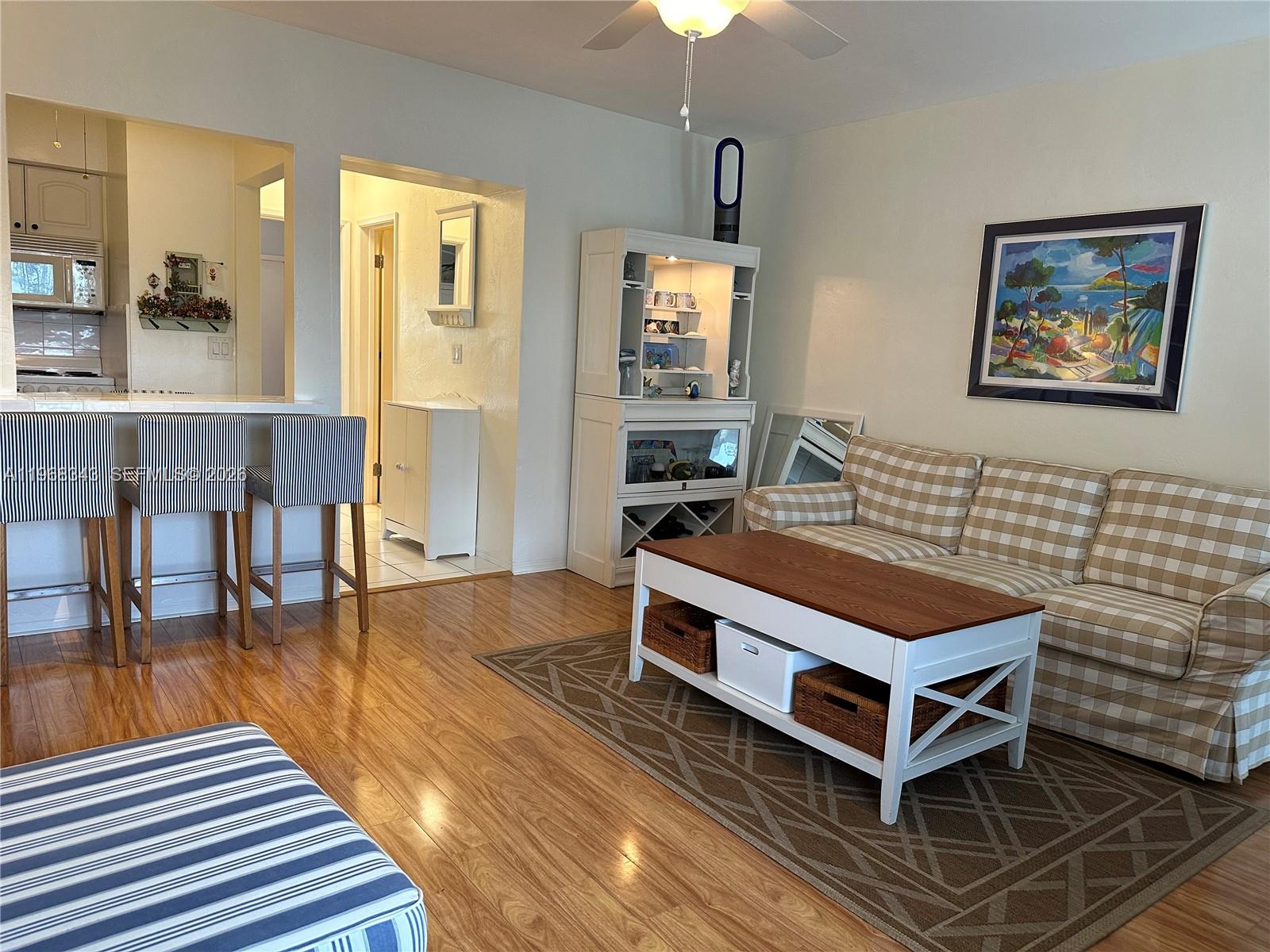 Awesome location in the heart of  Hallandale Beach for this beautifully furnished 1 bedroom 1 bath updated home ! Move In ready with Impact Windows, New Swimming Pool, and an Extra Storage Space. Conveniently located next to Hallandale Beach, Walmart, Publix, CVS, Many Restaurants, Casinos and Medical facilities. The interior features include a queen sized bed with dressers, a desk and 2 tv's plus a built in murphy bed with a queen size mattress for guests. The kitchen is fully stocked with dishes and cooking equipment. Dining for four or eat at the open bar! Lowest maintenance fees in the area. Laundry facilities on site and a new heated pool to enjoy. East of US 1 and munutes away from main highways and airports.