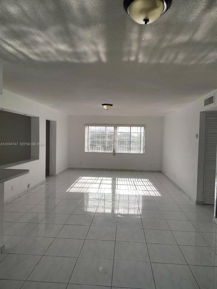 This 2-bedroom, 2-bathroom corner unit features a bright, open layout with abundant natural light throughout. Community amenities include a pool, clubhouse, and BBQ area. Ideally located just minutes from Gulfstream Park, the beach, and a variety of shops and dining options. Schedule your showing today.