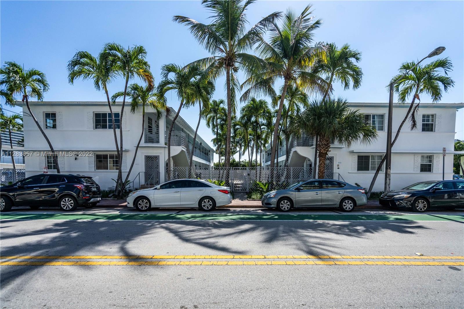 MOVE IN WITH JUST 2 MONTHS! INCLUDES ASSIGNED PARKING! NEWLY RENOVATED front corner 1BD apartment in MiMo style courtyard building with beautiful sundrenched pool, just steps away from 36 acre beachfront park! This residence features brand new wood toned flooring, stylish kitchen with quartz countertops & SS appliances including dishwasher + microwave, In Unit W/D, chic bathroom, walk-in closet and more. Building features gated entrance, secured parking, beautiful pool with sundeck, and lush landscaping. More amenities coming! Pets Welcome! **Parking available for rent for $75/M**