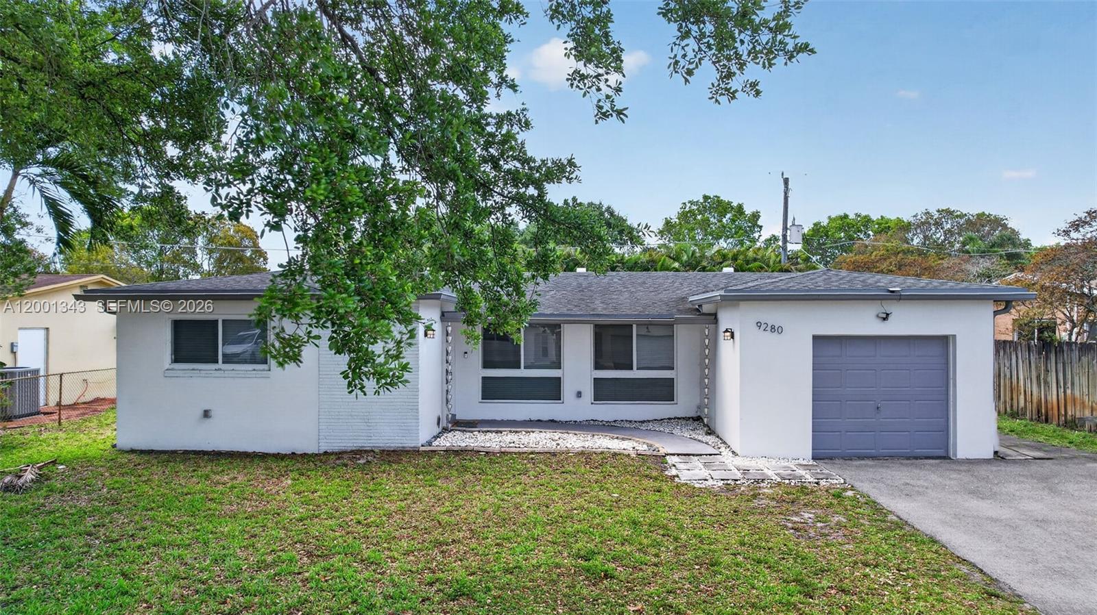 Welcome to this beautifully remodeled single family home in the highly sought after Cooper City community! This charming and turn key residence offers 3 spacious bedrooms, 2 updated bathrooms, plus a versatile room that is perfect for a home office, playroom, or den. Step inside to discover a bright, open interior with brand new flooring throughout and a thoughtfully designed layout that blends comfort with modern style. The stunning, fully renovated kitchen serves as the heart of the house, showcasing sleek finishes, contemporary cabinetry, and ample space for cooking and entertaining. Designed with both convenience and peace of mind, this home includes major upgrades such as impact windows, a new electrical panel, and updated systems throughout. Natural light fills the living spaces, creating a warm and inviting atmosphere ideal for both relaxing and hosting guests. Step outside to enjoy a private backyard with plenty of room for outdoor dining, entertaining, or even adding a pool which is perfect for embracing the South Florida lifestyle. Ideally located just minutes from schools, parks, shopping, dining, and major roadways, this house offers the perfect balance of comfort, location, and value. Whether you're a first time buyer, growing family, or simply looking to upgrade, this remodeled gem is an opportunity you don’t want to miss!