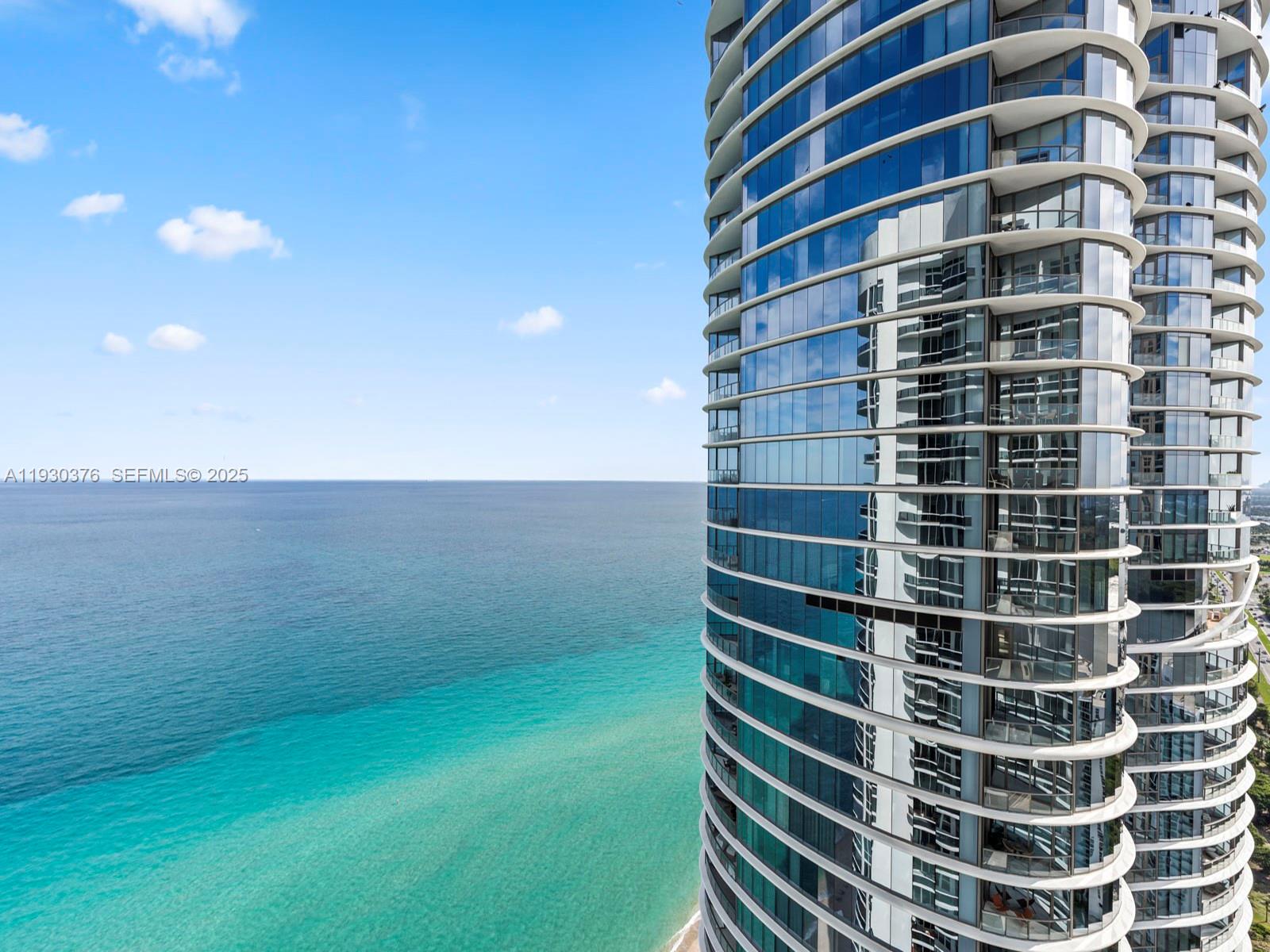 Perched high above the coastline, Apartment 3707 at 15811 Collins Ave in Sunny Isles Beach is a beautifully renovated residence offering stunning ocean and city views and an elevated lifestyle from the moment you arrive via your private elevator. Inside, 12-foot ceilings amplify the light and create an airy, open feel throughout the home. Modern finishes and refreshed interiors pair with a comfortable layout ideal for everyday living or a luxurious getaway. Enjoy a private beach experience with chairs and full service, plus a full-service restaurant on site for effortless dining. The building delivers peace of mind and convenience with security patrol, valet for guests, and resort-style amenities that make every day feel like a vacation. Perfectly positioned near world-class dining and daily essentials, you’re just minutes from top destinations including Aventura Mall and Bal Harbour Shops, along with nearby restaurants and stores for total convenience.