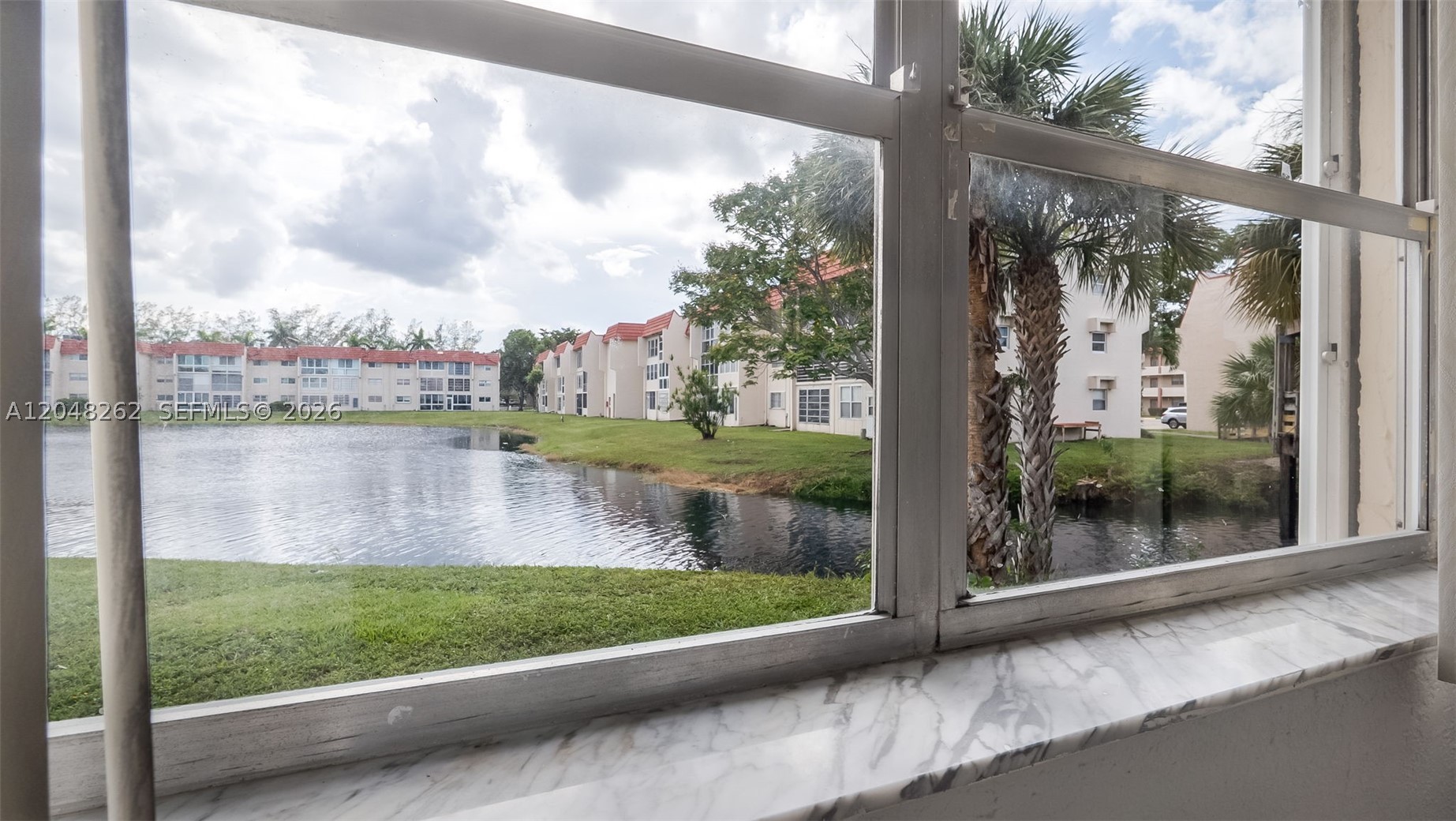 SUNRISE LAKES 14 CONDO - Residential