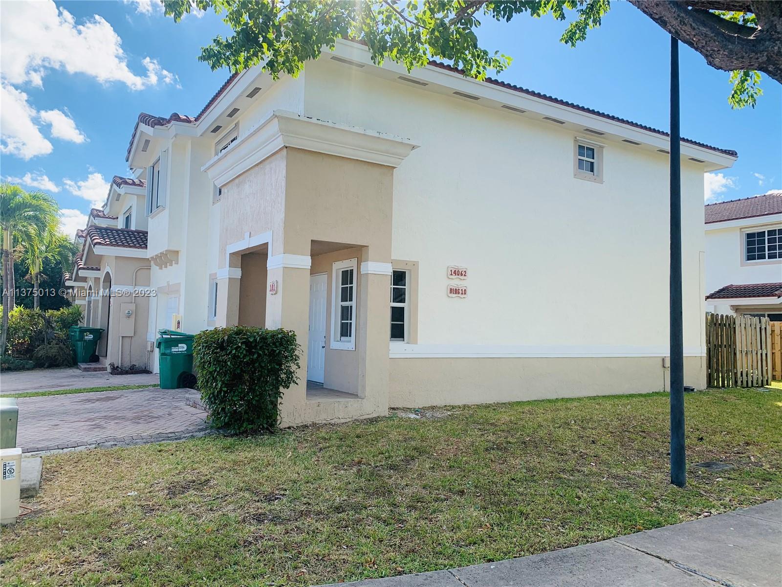 Amazing townhouse in a quiet community with 2 master bedrooms with bathrooms on each bedroom and 1/2 bathroom in living room area. Recently painted, tile and wood floors, washer & dryer on unit, 2 parking spaces and guest parking. Gated community with exercise room and community pool. Low monthly dues.