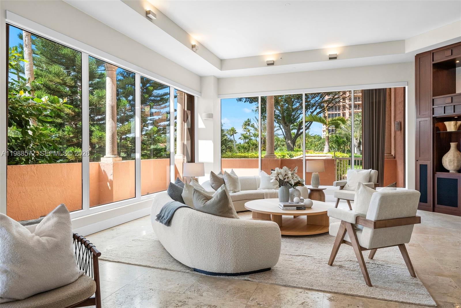 Nestled within the prestigious Gables Club, this exceptional Lanai South residence offers a rare blend of space, privacy, and effortless indoor-outdoor living in the heart of Coral Gables.

This expansive 4-bedroom residence, complete with a dedicated staff room, is thoughtfully designed to provide both comfort and functionality. Generously sized bedrooms are filled with natural light, creating a bright and airy atmosphere throughout the home, while the well-designed layout offers both privacy and flexibility.

Spacious balconies extend the living areas outdoors and connect directly to the lush garden grounds of Gables Club, creating a unique lanai-style experience. This seamless connection to greenery enhances the sense of tranquility and provides a true indoor-outdoor lifestyle rarely found in condominium living.

The residence also benefits from the security and exclusivity of Gables Club, offering peace of mind while maintaining the warmth and feel of a private home. With its garden access, expansive layout, and house-like ambiance, this property delivers the best of both worlds—luxury condominium convenience with the comfort and privacy of a single-family residence.

** The images has been digitally altered for virtual staging.