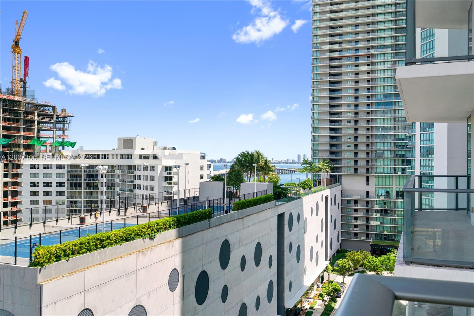 Spacious and modern, this 2-bed/2-bath + den features a sleek kitchen with top-tier BOSCH appliances, floor-to-ceiling windows, ample closet space, and a private and long terrace with wonderful views. Enjoy resort-style amenities: rooftop & 5th-floor pools, fitness center, spa, tennis, BBQ, cinema, and 24/7 concierge. Best-priced unit line 10 available Don’t miss this deal! Prime location just minutes from Design District, Midtown & Wynwood. Luxury, Views & Amenities at an Incredible Value. Vacant, Ready to move in!