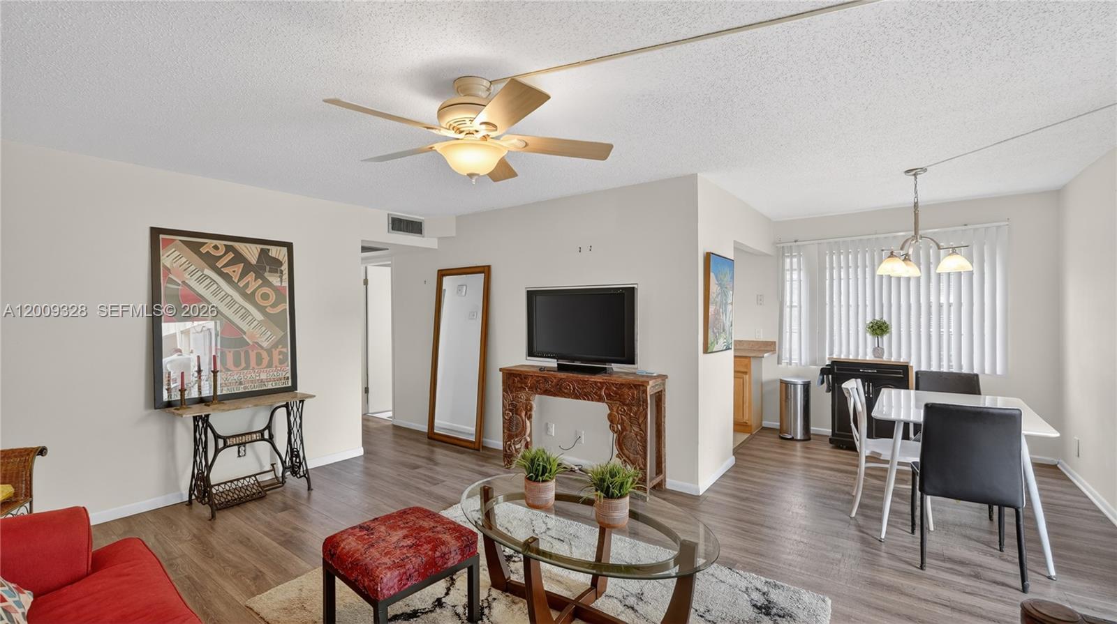 Step into a bright, move-in ready 2-bedroom, 1.5-bath residence in the gated 55+ community of Century Village Boca Raton, where comfort meets convenience. This second-floor unit offers 840 sq ft of well-laid-out living space plus a private enclosed patio with peaceful green views, perfect for relaxing year-round. Inside, you’ll find updated flooring in the main areas, a clean, functional kitchen with stainless steel appliances, spacious bedrooms with great storage including a walk-in closet, and a walk-in tub/shower for ease and accessibility. Offered fully furnished for a seamless move-in, the building features elevator access, laundry on every floor, assigned parking, and ample guest spaces. The HOA includes cable, internet, water, and access to an unmatched amenity package with a massive clubhouse, fitness center, theater, pools, tennis, pickleball, and endless social activities, all within a secure, guard-gated community with transportation and on-site conveniences.