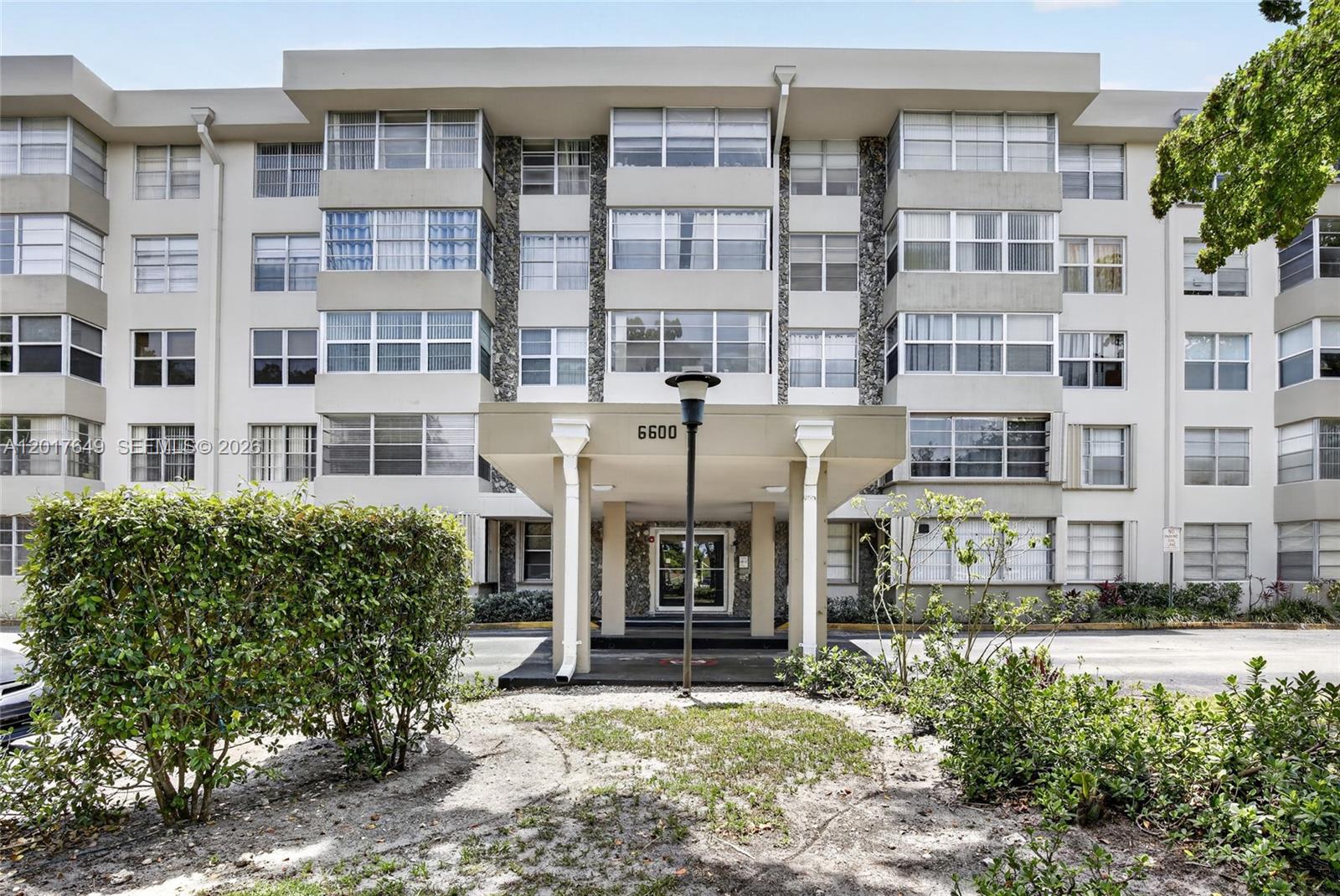 Renovated & spacious 2 bed 2 bath condo in the heart of Plantation. The kitchen boasts white shaker wood cabinetry, stainless steel appliances, and granite countertops. Stunning wood floors throughout main living area and bedrooms. Enjoy an open layout with tons of storage and 2 closets in primary bedroom. Building has passed 40-year inspection. Prime location—walk to Publix, Starbucks, and dining; minutes to Plantation Walk, shopping, FLL Airport & major highways. Secure building with lobby, interior hallways, elevator, laundry on same floor, 1 assigned & guest parking. Amenities include pool, clubhouse, gym, sauna & BBQ area. No leasing first 3 years.