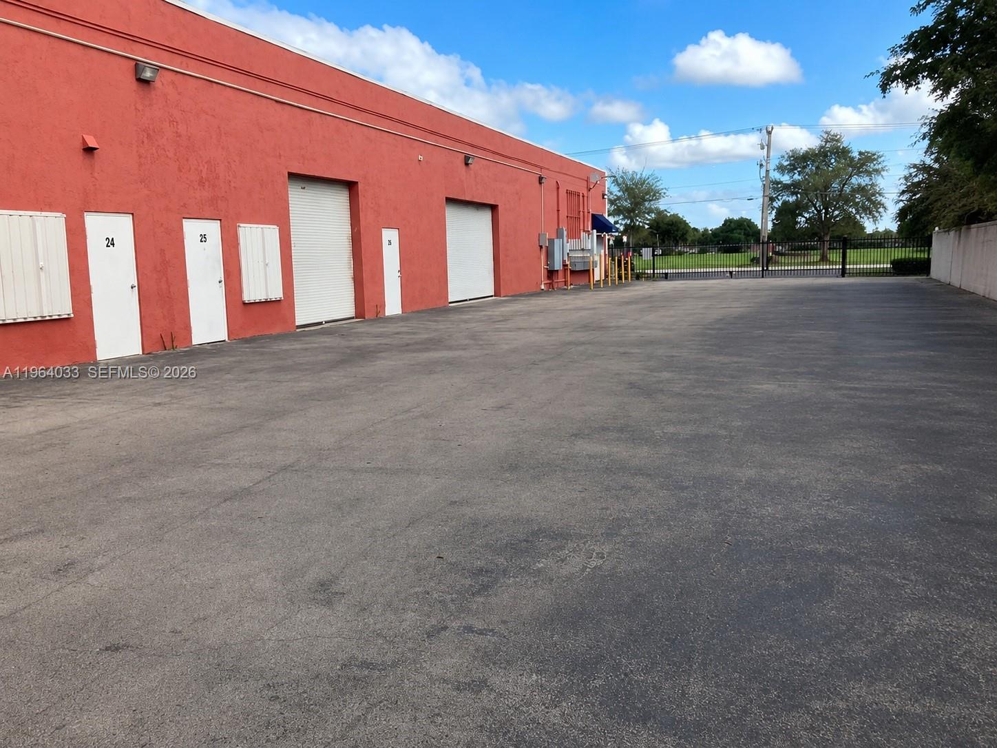 Well-maintained industrial/flex space ready for immediate occupancy. This unit features three private offices, one full bathroom, and approximately 700 SF of warehouse area with a front-loading roll-up door and access from both the front and rear of the building. The space is ideal for a variety of light industrial or business uses. HOA includes water, roof, and insurance. Seller is willing to sell the existing sign business inventory separately (not included in the purchase price). Conveniently located near Florida’s Turnpike, Tamiami Airport, and shopping centers.