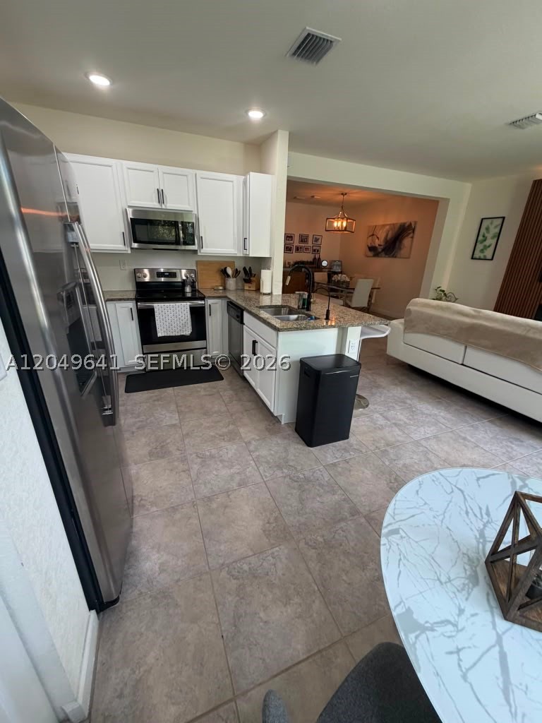 AQUABELLA SECTION TWO - Residential Lease