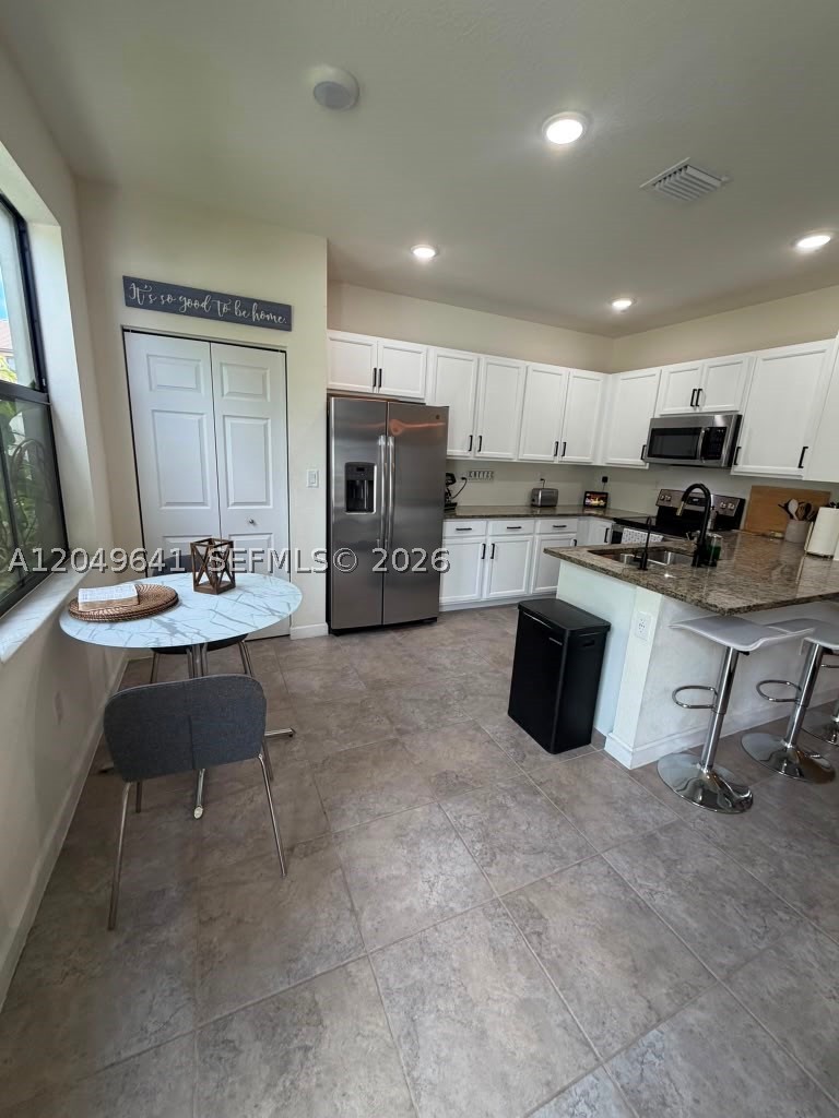 AQUABELLA SECTION TWO - Residential Lease