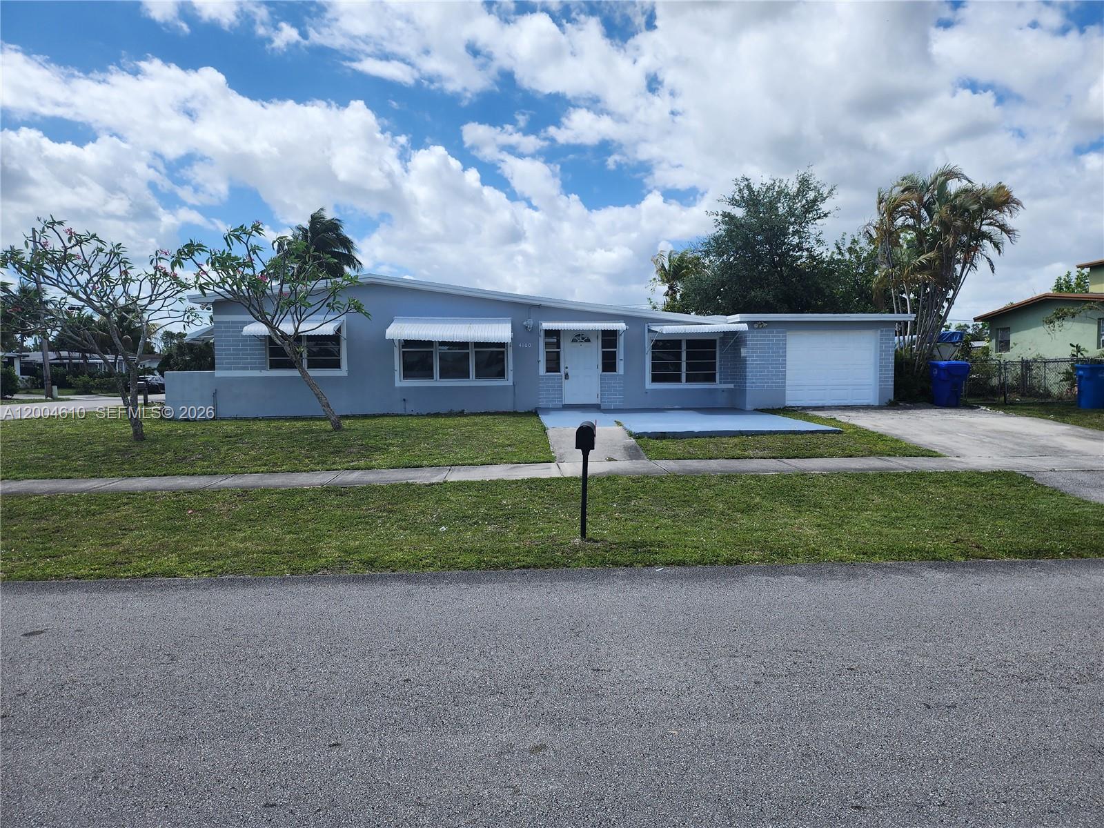 Great opportunity in a desirable neighborhood! This single-family home is currently configured as two separate living spaces, each with a private entrance and dedicated parking. The main residence features 3 bedrooms, 1 bathroom, a spacious living area, full kitchen with dishwasher, and a new washer and dryer. The secondary living space offers 1 bedroom, 1 bathroom, a living area, and a full kitchen, providing flexibility for extended family, guests, or potential rental income. Property may be converted back to a traditional single-family residence at the buyer's expense. Buyer to verify all uses, configurations, and applicable zoning requirements.