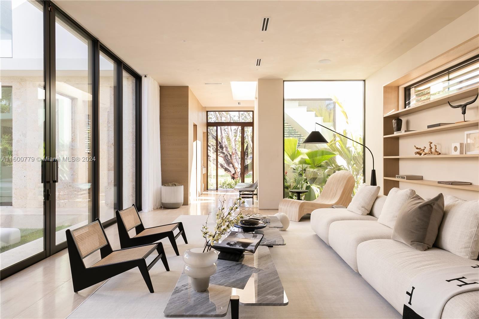 “La Corte”, a brand new construction masterpiece completed May 2024. Designed by Italian architects Gaia Sonzogni & Andrea Benedetti, this 4,168 sf home features a U-shaped layout prioritizing comfort & privacy. Highlights include coral rock cladding, 11’ ceilings, travertine & European oak floors, & custom Italian millwork. With 4 bedrooms, 4.5 bathrooms, & expansive living areas, enjoy a lap pool, spa pool, outdoor kitchen, & a 1,000 sf courtyard. Boasting LEED Platinum certification, smart-home systems, multi-cooling power, upgraded insulation, & solar power, La Corte seamlessly blends elegance & sustainability. Every detail, from the hand-painted limewash walls to the meticulously crafted cabinetry, exudes sophistication. Enjoy luxury living w/ thoughtful design & energy efficiency.