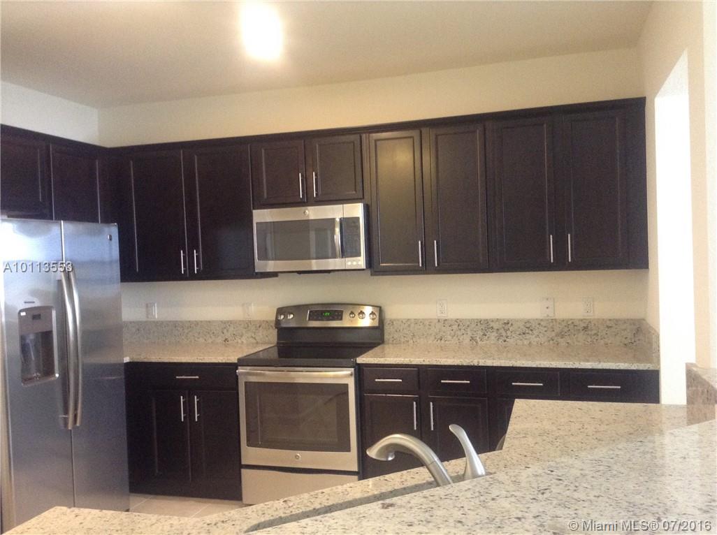 All new! Excellent location in front of Ronald Reagan High school, ADAGIO at Doral, granite countertops, new stainless steel appliances and more