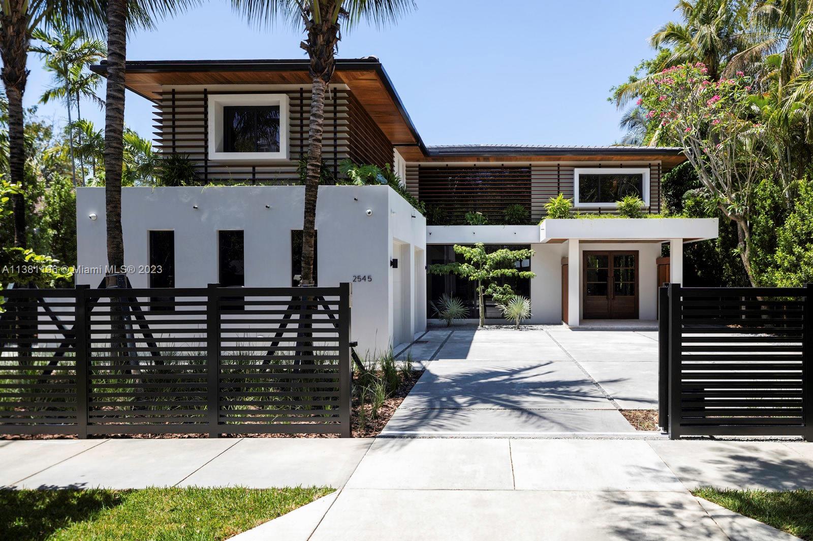 Just completed! Spectacular new construction home located in a quiet dead-end street in prestigious North Coconut Grove walking distance from the marinas, parks, and Grove village. The home features 6 bedrooms, 7.5 baths, a massive open kitchen with top of the line appliances, double dishwasher and pantry with ample storage space. Other features include a 400+ bottle wine room, two car garage, and elevator. Step into the dreamy master suite featuring a luxurious spa-like bathroom retreat with his and hers showers and smart Toto toilets. Enjoy the beautiful Miami weather while entertaining outdoors in the enormous covered terrace appointed with fully loaded summer kitchen overlooking a crystalline heated, salt-water lap pool, and lush greenery. No detail was overlooked!(5418 sf LA, 6608 TA)