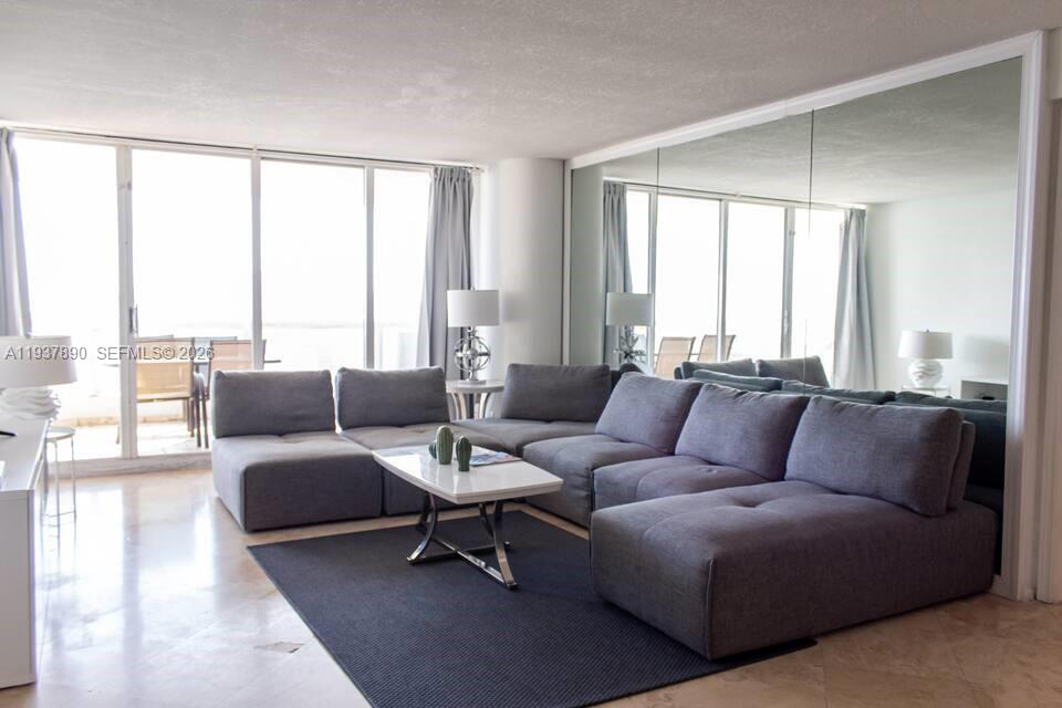 PENTHOUSE unit with a large balcony overlooking panoramic views of Biscayne Bay, Port of Miami, and the Miami skyline. Excellent floor plan, two bedrooms, and a converted third bedroom/den/office. Huge kitchen with high-end appliances, quartz counters, and Porcelain flooring throughout the unit. Exceptional modern and light interior. EVERYTHING in this unit is brand new. Amazing amenities, restaurants, convenience store, pharmacy, Doctor`s office, beauty salon, marina, and more. Perfectly centralized and minutes from Downtown Miami, Brickell, the Design District, Wynwood, Lincoln Road, Port of Miami, and Sobe…Steps from the Performing Art Center, the Entertainment District, and the Venetian Isles.