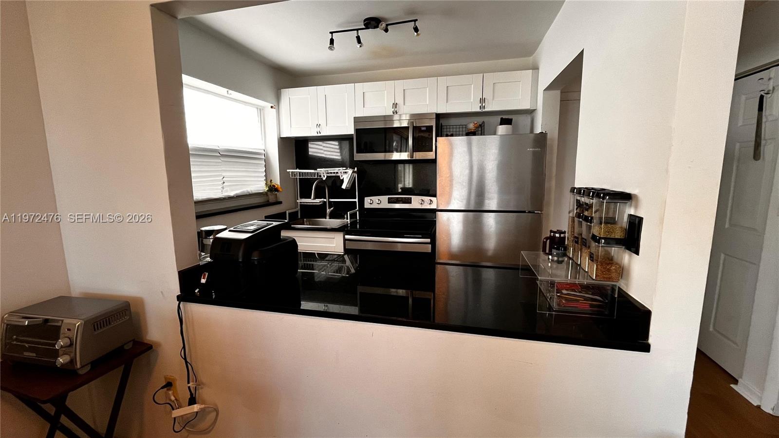 This unit offers newly updated flooring. The mid-rise building has only 32 units. Can be rented immediately for 12 months minimum. Pet-friendly building located in a secure building on Normandy Isles, walking distance to shops and restaurants. Miami Beach condo, 1 bedroom + 1.5 bathrooms, balcony, nice quiet building on Normandy Isle, around the corner from Golf Course, Normandy Park and Pool.