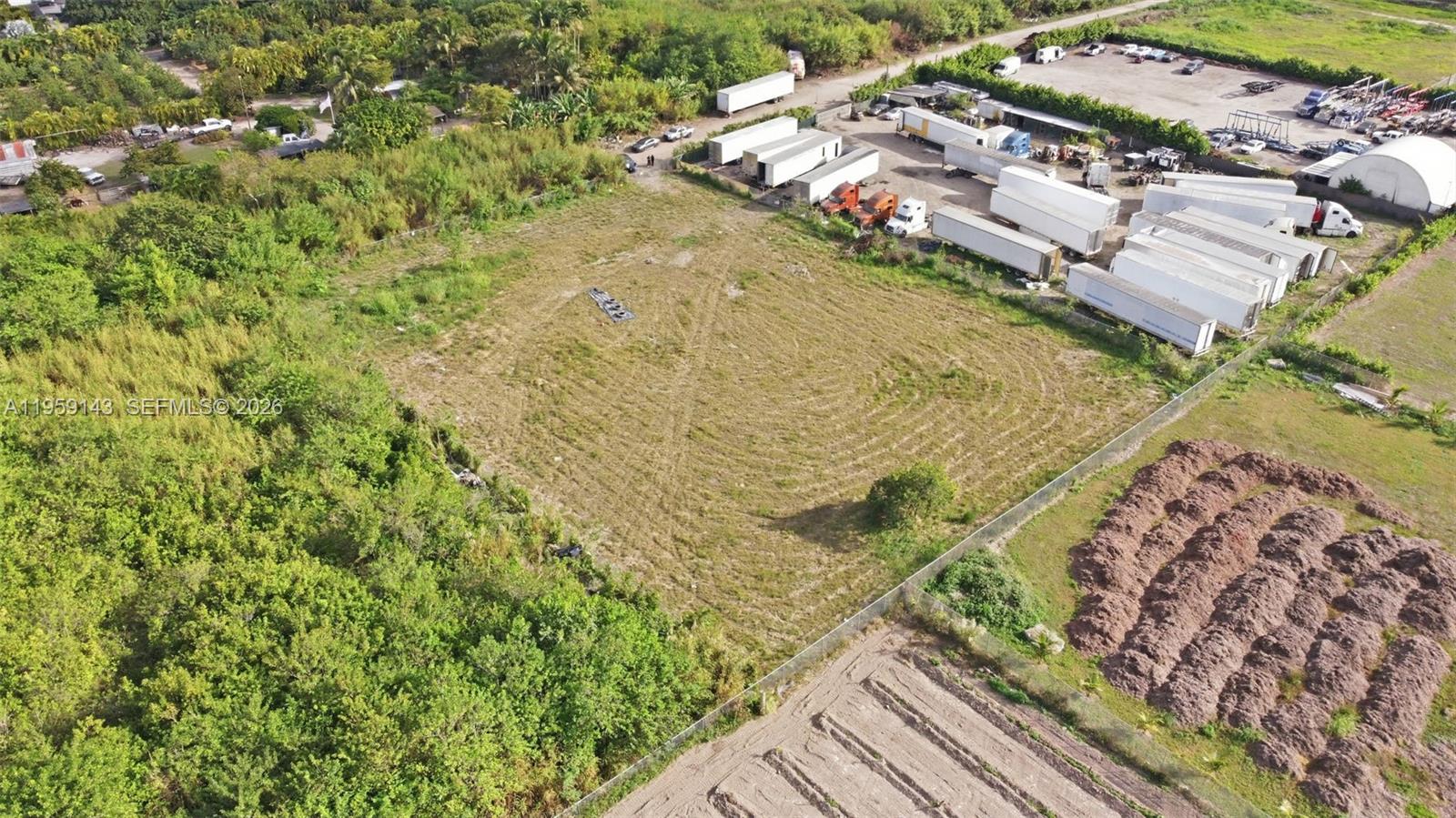 Incredible land opportunity in the heart of the Redlands! This expansive 1.5-acre parcel is located in a rapidly growing area just minutes from Krome Avenue, offering both privacy and convenience. The property is fully fenced and features existing utilities including electricity and water, along with a patio and stables — ideal for agricultural use, horses, or building your dream estate. Endless potential for investors, builders, or homeowners seeking space and flexibility. A must see! Please call the listing agent to schedule a private showing. THIS LAND IS LOCATED 3 FOLIO'S NORTH OF 16010 SW 207TH AVE MIAMI FL 33187.