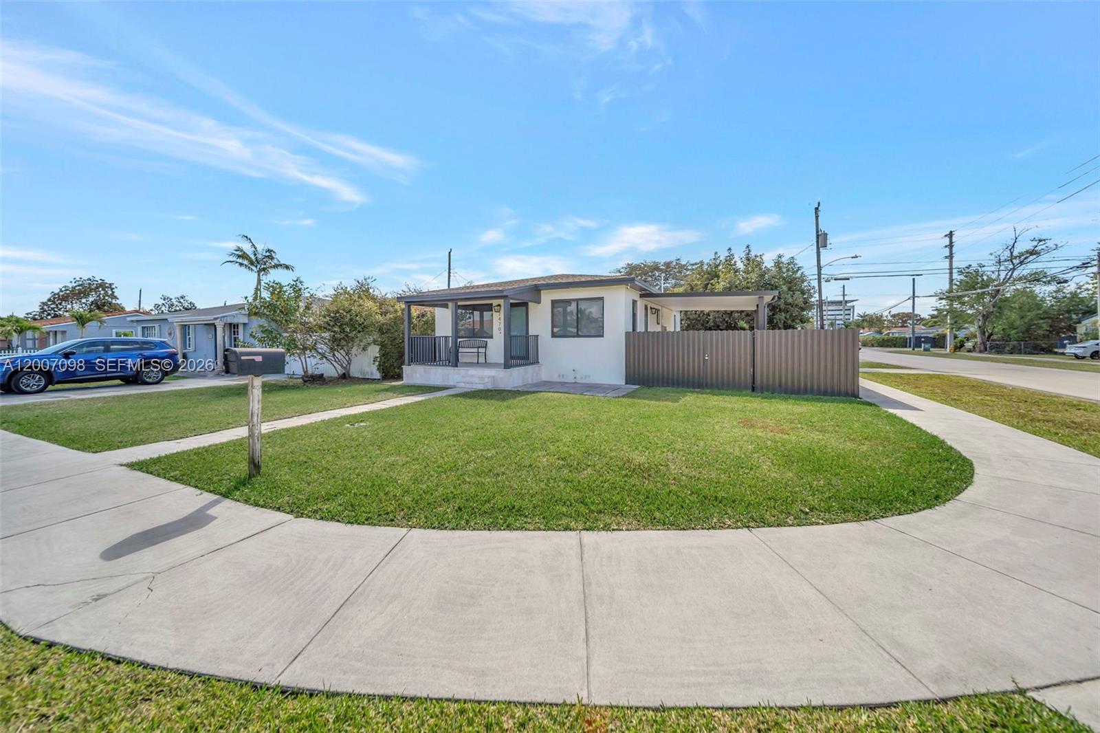 Beautifully upgraded three bedroom, one bathroom cozy retreat in the heart of Miami. Enjoy the privacy of a fenced in property with motorized gate entry. This home is fully updated and move-in-ready. Enjoy marble floors on the porch as you enter the house, impact glass throughout, fresh paint inside and out, new fixtures, and so much more! Relax on your large, covered patio, which can also function as covered parking. The yard has a large storage shed and fruit trees. Eight year old roof and a new electrical panel with wiring. A highly sought-after location with all the restaurants and shopping you could ask for. Tropical Park and AD Barnes Park less than a 1.5 miles away.