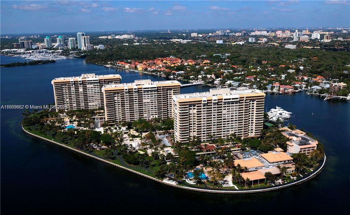 GROVE ISLE offers a beautiful, bright and spacious. unit with 2 bedroom - 2 bathroom! Breathtaking sunset, Bay views and magnificent Landscaping from all the rooms and social area. Open kitchen very spacious offering SS appliances, lots of cabinets. Located in an exclusive private island in Coconut Grove. The building offers Valet, security 24/7, management office on site. BBQ area with a magnificent Bay view! Residents can bike to Coconut. Grove shopping center, cafes, restaurants and much more. For showing instructions, please see Brokers Remarks.