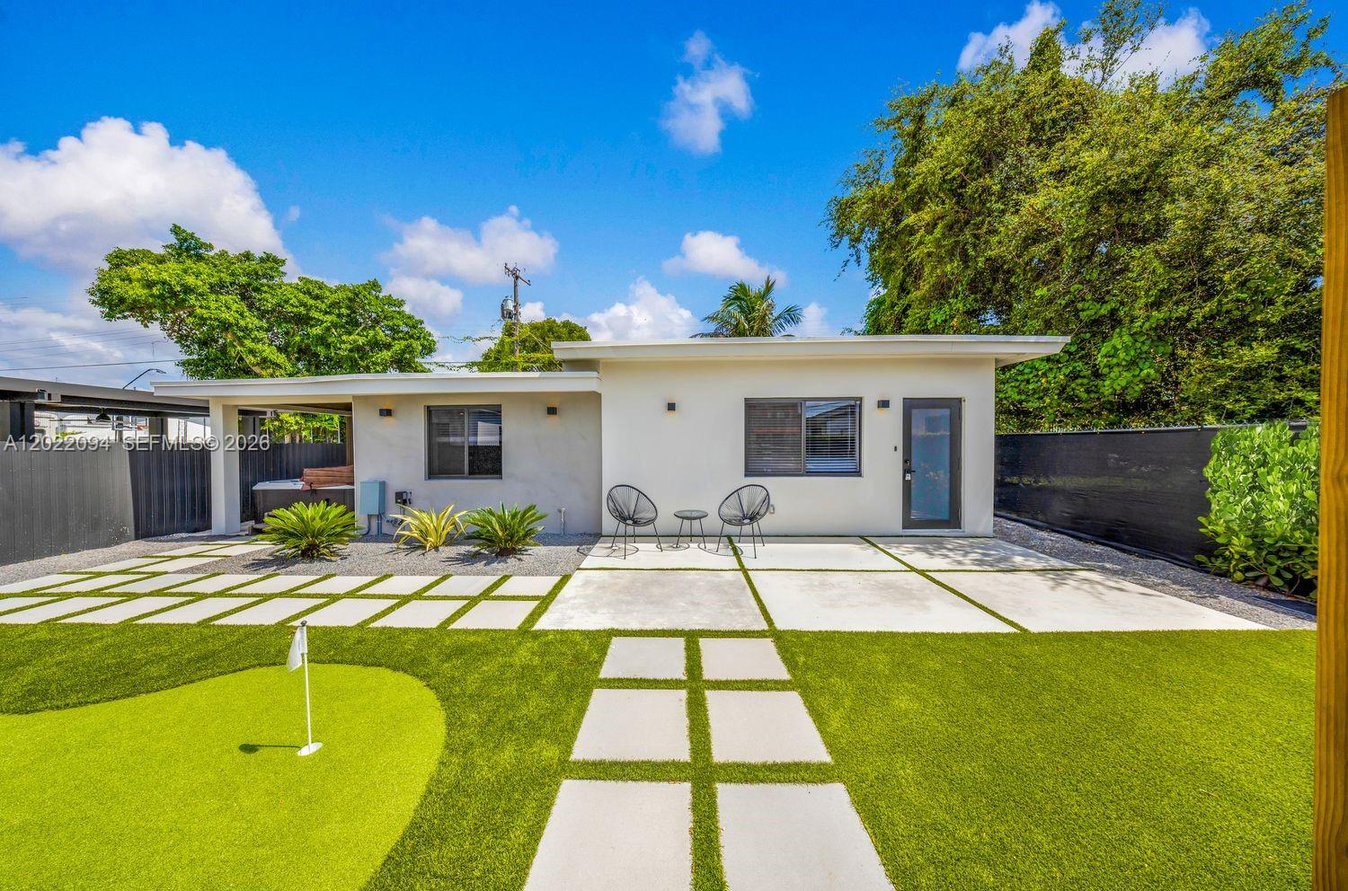 Turnkey, fully permitted, and INCOME PRODUCING, this newly renovated 5-bedroom, 3-bath home offers immediate upside for investors, tenants, or end users. Located just minutes from the Design District, the property features a functional open layout with generous living spaces, a modern kitchen with sleek appliances and cabinetry, and updated finishes throughout the home. The backyard is designed for entertaining with an above-ground pool, hot tub, basketball court, and covered dining area with space to grill and gather. With strong monthly revenue and financials available upon request, this move-in ready home presents a compelling opportunity in one of Miami’s hottest neighborhoods.
