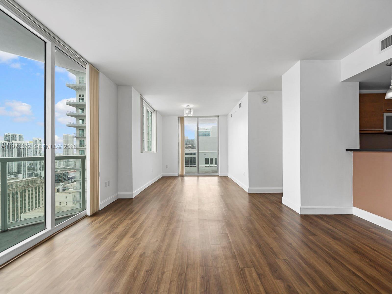 Beautiful 2 bedroom, 2 bathroom condo in the highly desirable building of Vizcayne, located right on Biscayne Blvd! This exquisite unit boasts partial water views, 2 balconies, a modernized kitchen, and a spacious floor plan. The primary bedroom features its own bathroom with a dual sink vanity and a large walk-in closet. Washer/dryer located conveniently inside the unit. This one-of-a-kind building offers amazing resort-style amenities including multiple pools over looking Bayfront Park & Bayside Market Place! Currently tenant-occupied, lease ends March 31st, 2028. HOA fee is $1,508.73/mo and the 2 special assessments are $696.78/mo (until Dec. 2027) and $405.90/mo (until May 2027).
