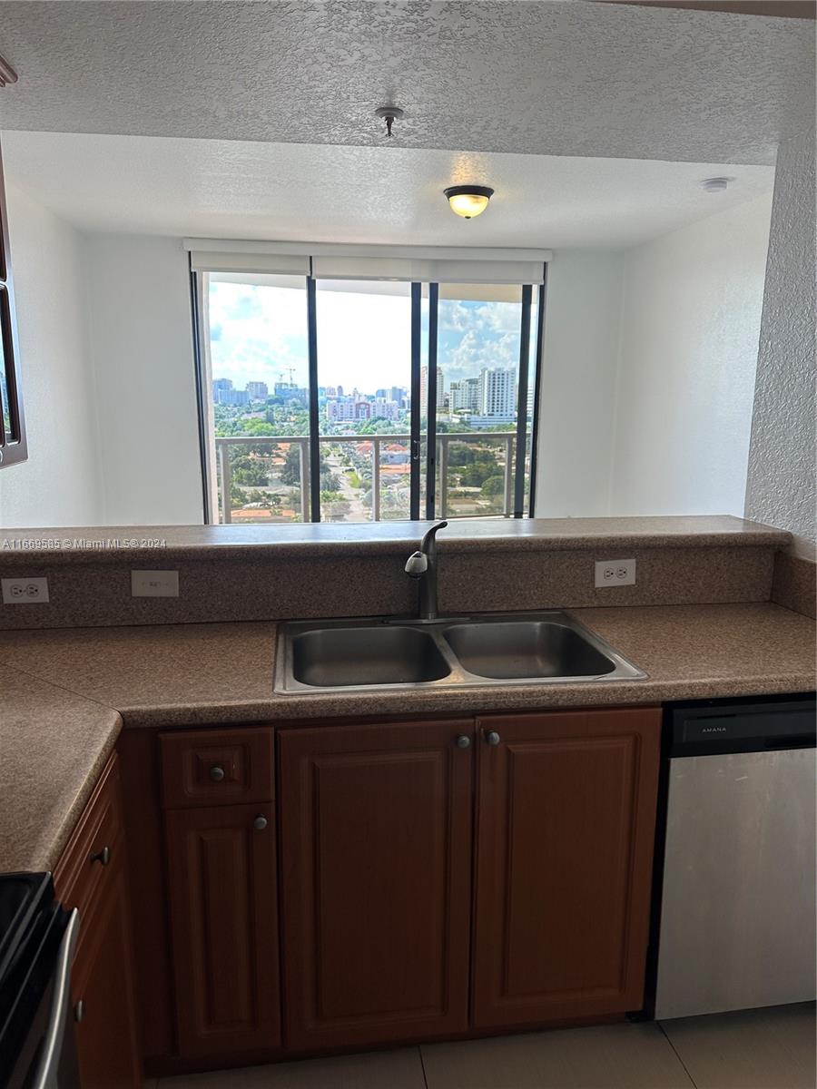 Experience urban living at its best in this spacious modern 1-bedroom, 1-bathroom unit at 2301 SW 27th Ave, Unit 1202. Enjoy breathtaking city views, along with a spacious, light-filled layout unit & balcony. The unit features a sleek, updated kitchen with stainless steel appliances and stylish finishes. Located in a well-maintained building with amenities like a pool and gym, this home is just minutes from Coral Gables, Coconut Grove, Downtown Miami, Key Biscayne, Miami Beach, shopping, and dining.